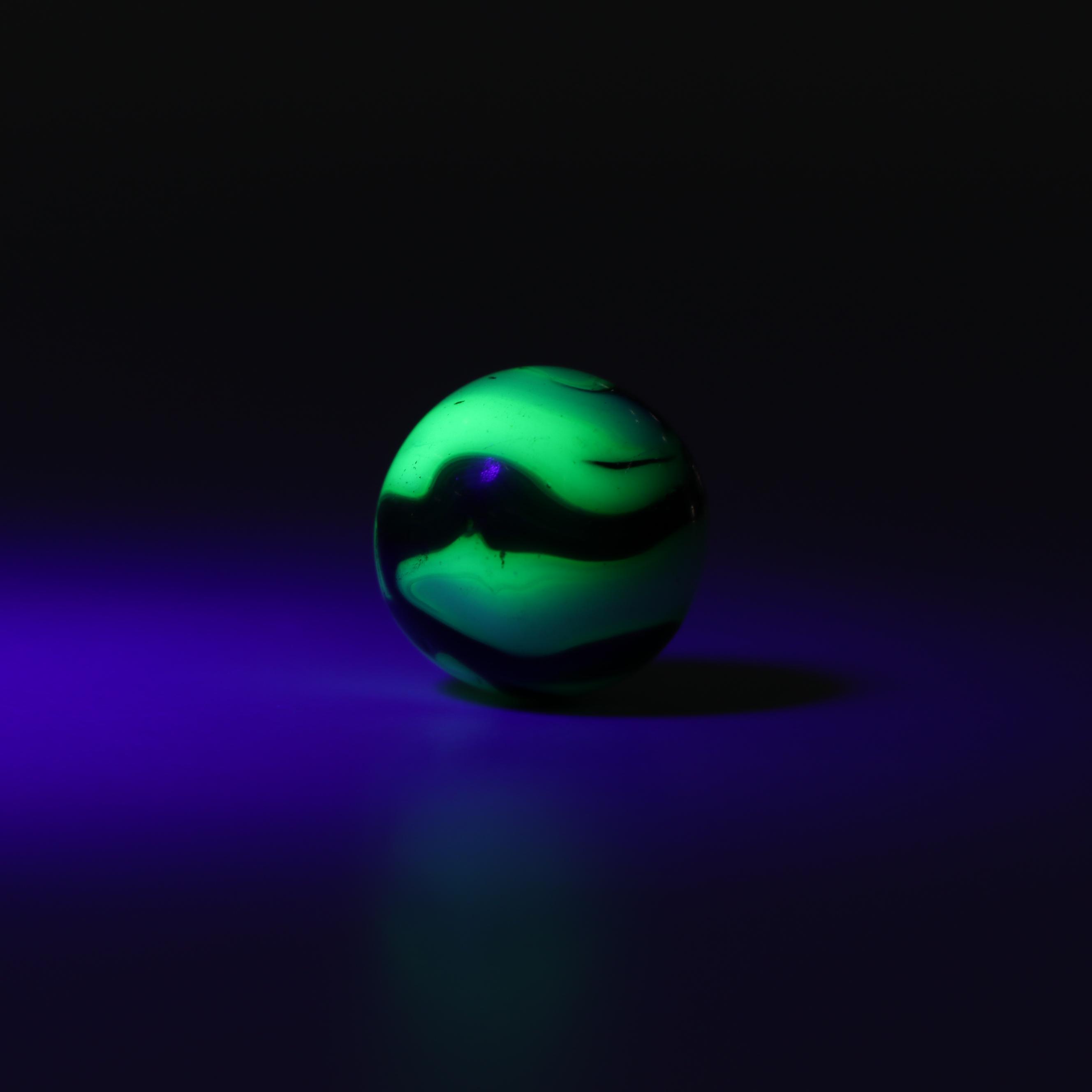 Akro Agate, Uranium Glass, and Other Glass Marbles with McDonald's Paperweight