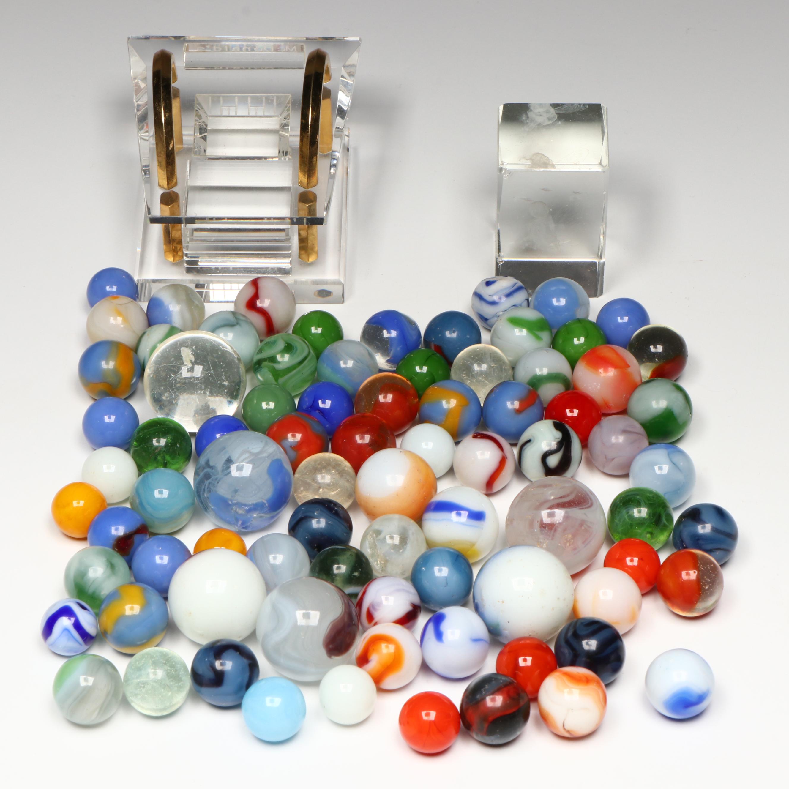 Akro Agate, Uranium Glass, and Other Glass Marbles with McDonald's Paperweight