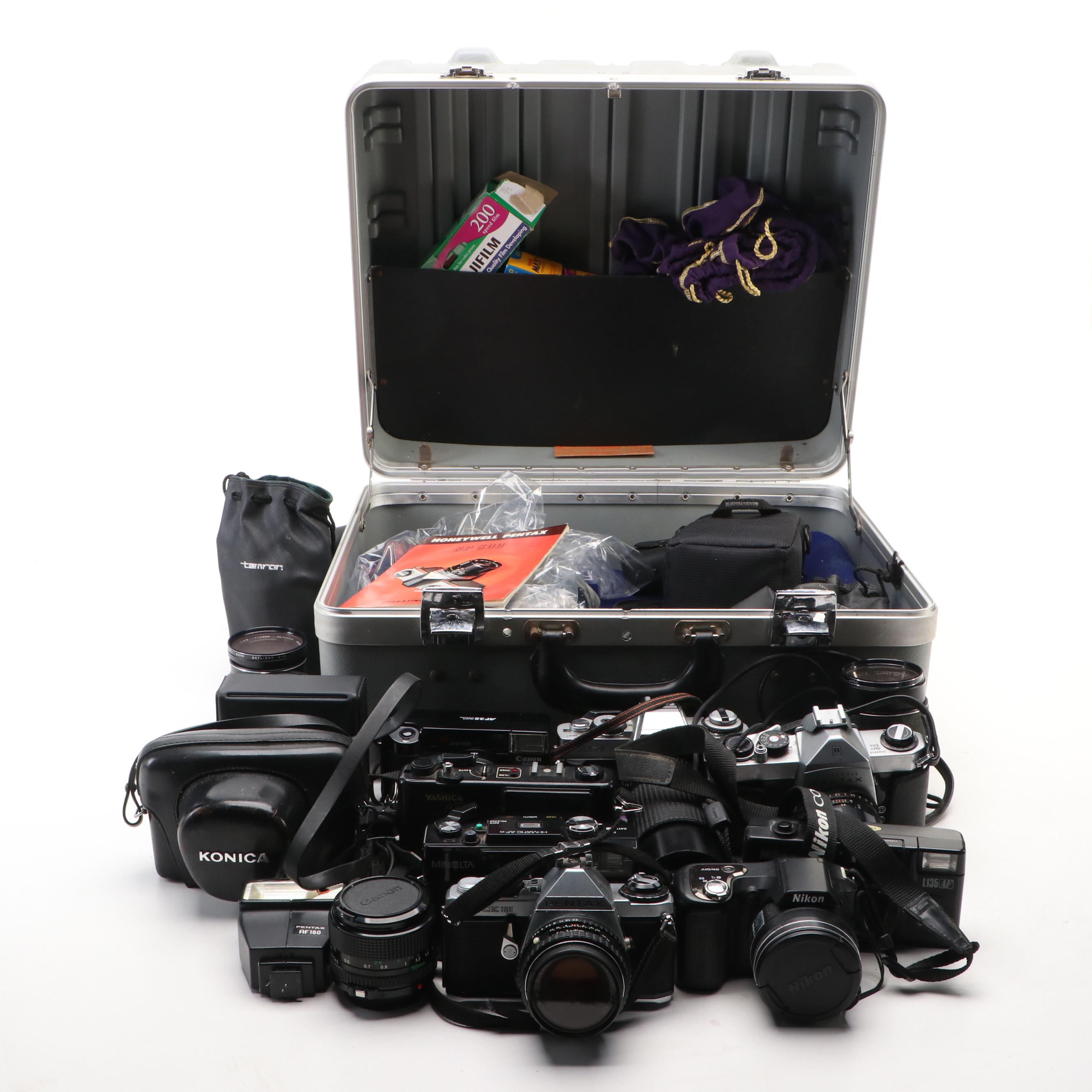 Collection of SLR Film Cameras with Hard Case and Other Accessories