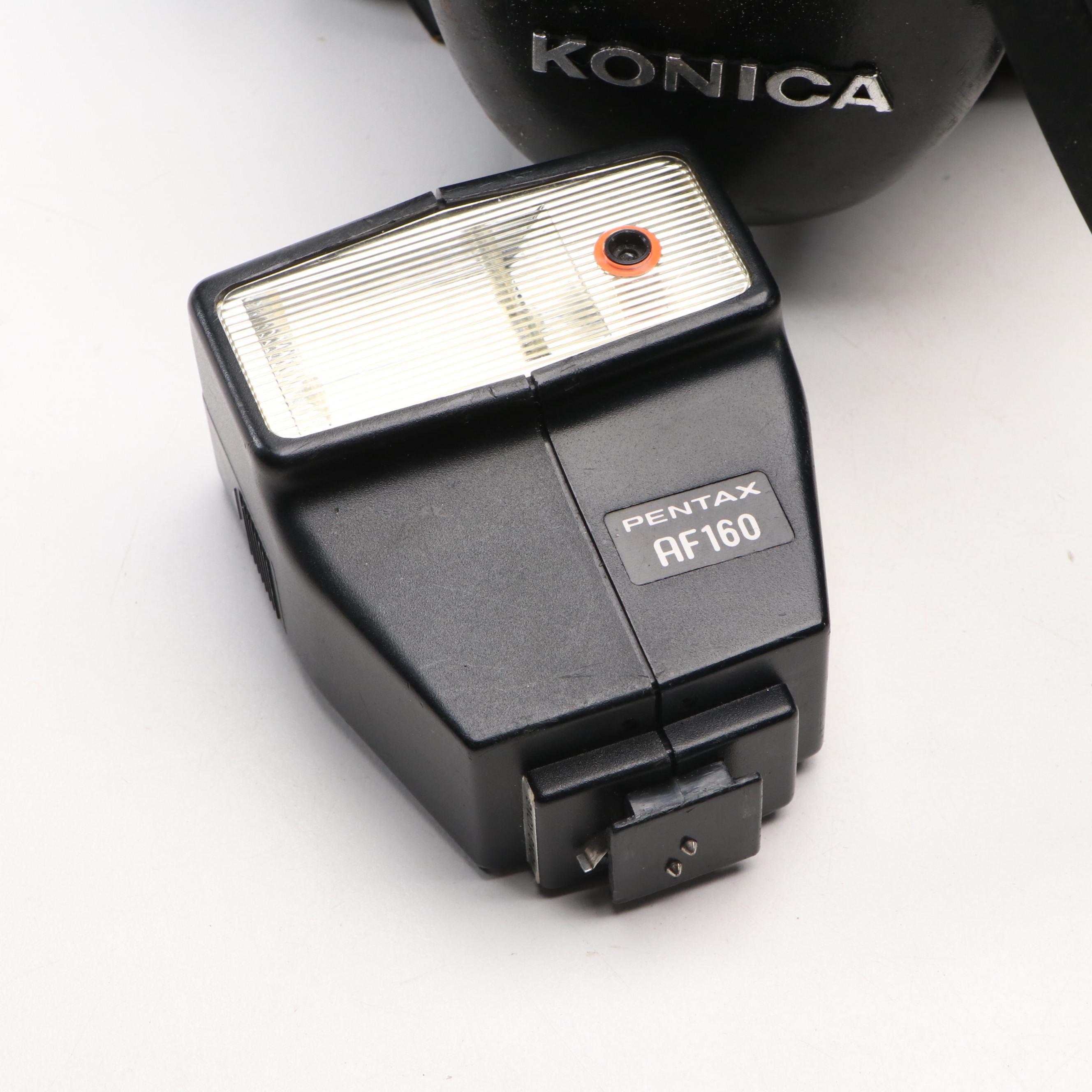 Collection of SLR Film Cameras with Hard Case and Other Accessories