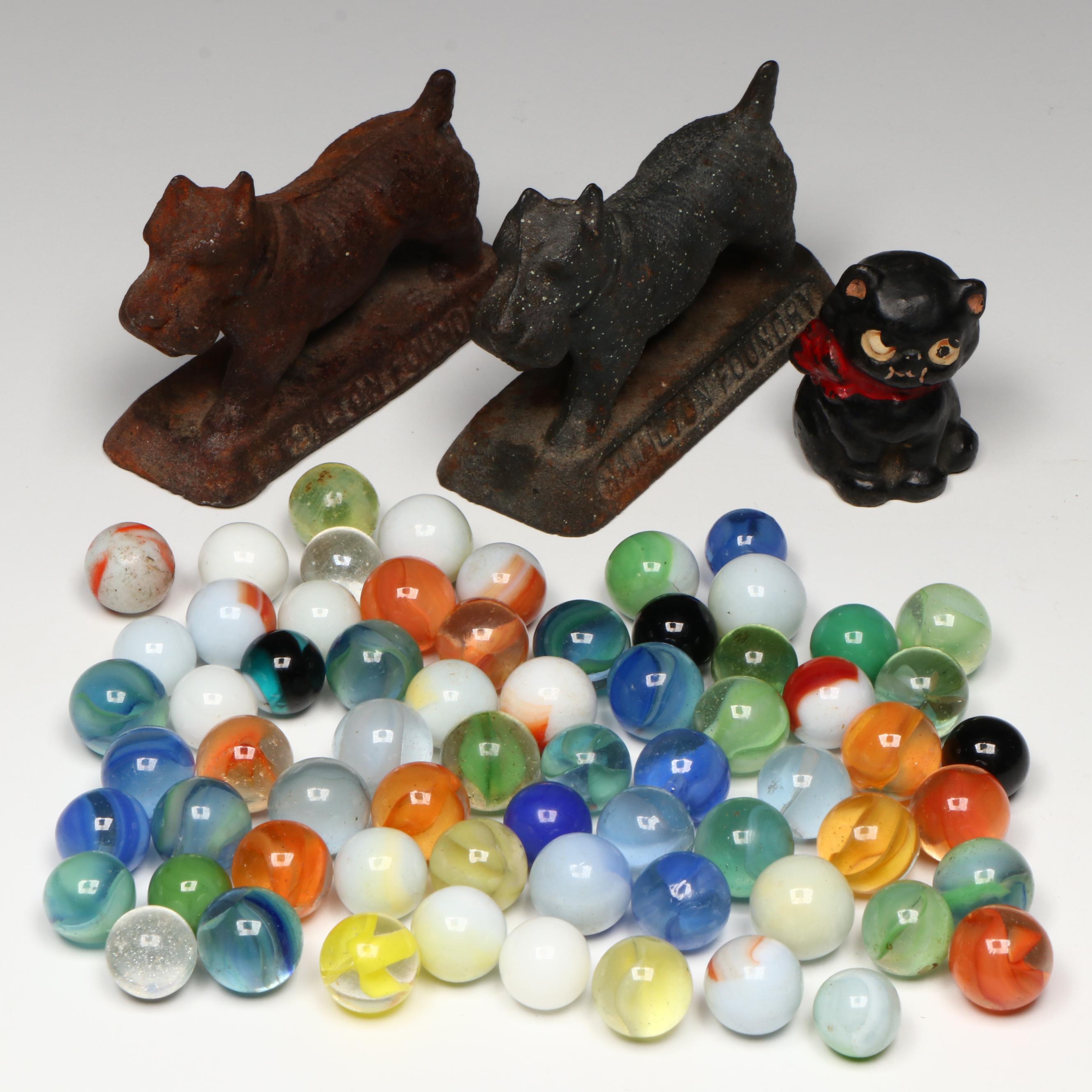 Uranium Glass, Cat's Eye and Other Marbles with Cast Iron Dogs and Cat