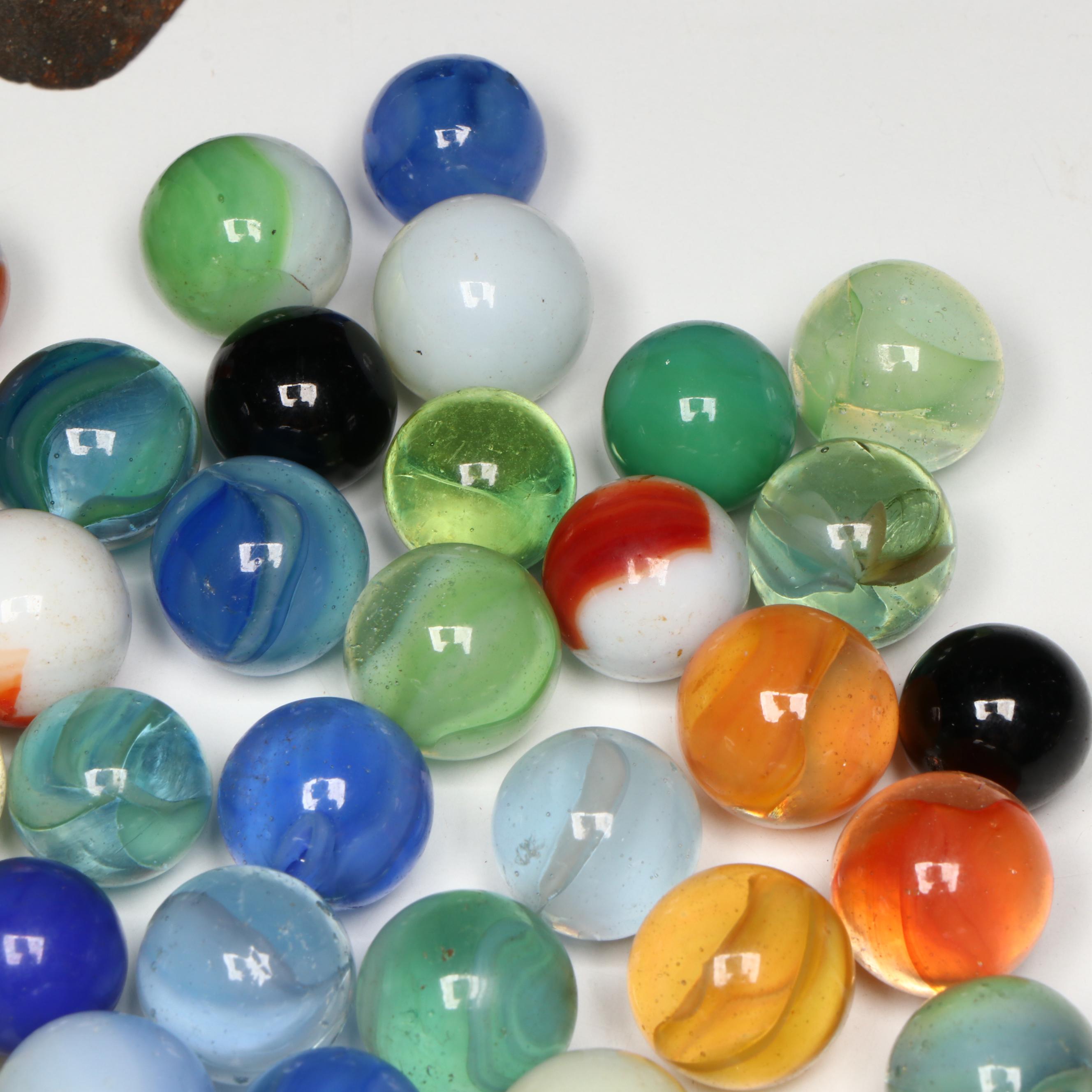 Uranium Glass, Cat's Eye and Other Marbles with Cast Iron Dogs and Cat