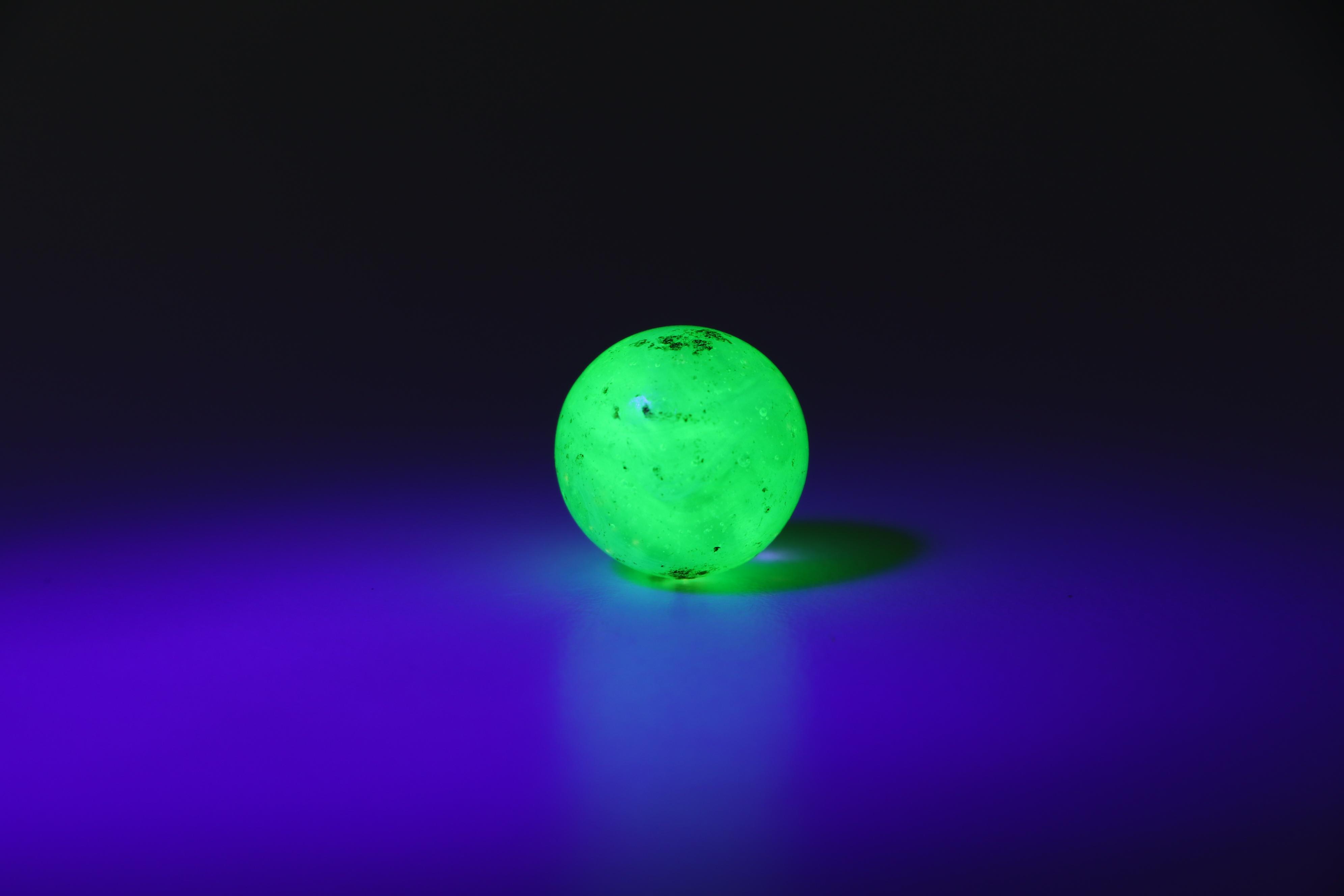 Uranium Glass, Cat's Eye and Other Marbles with Cast Iron Dogs and Cat