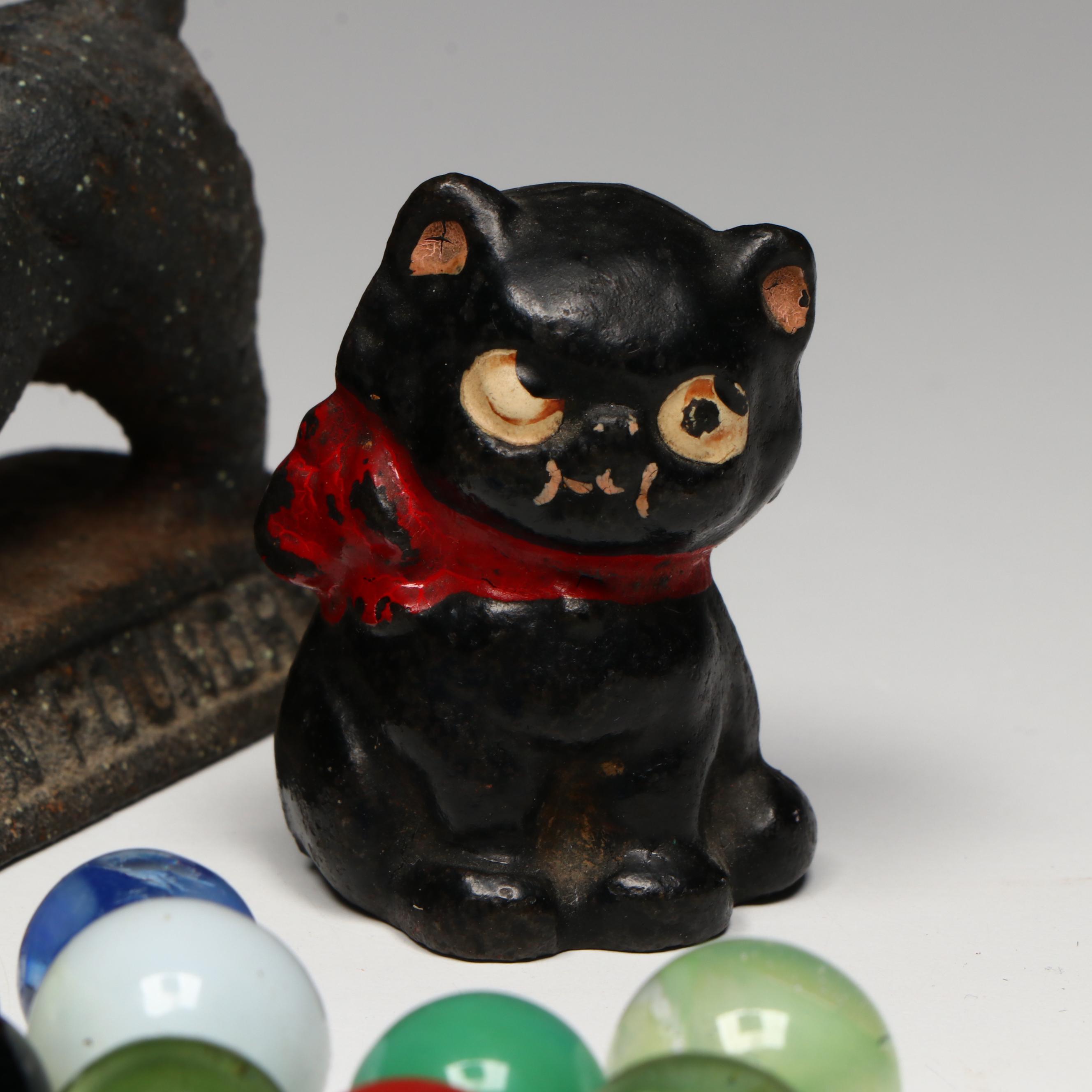 Uranium Glass, Cat's Eye and Other Marbles with Cast Iron Dogs and Cat