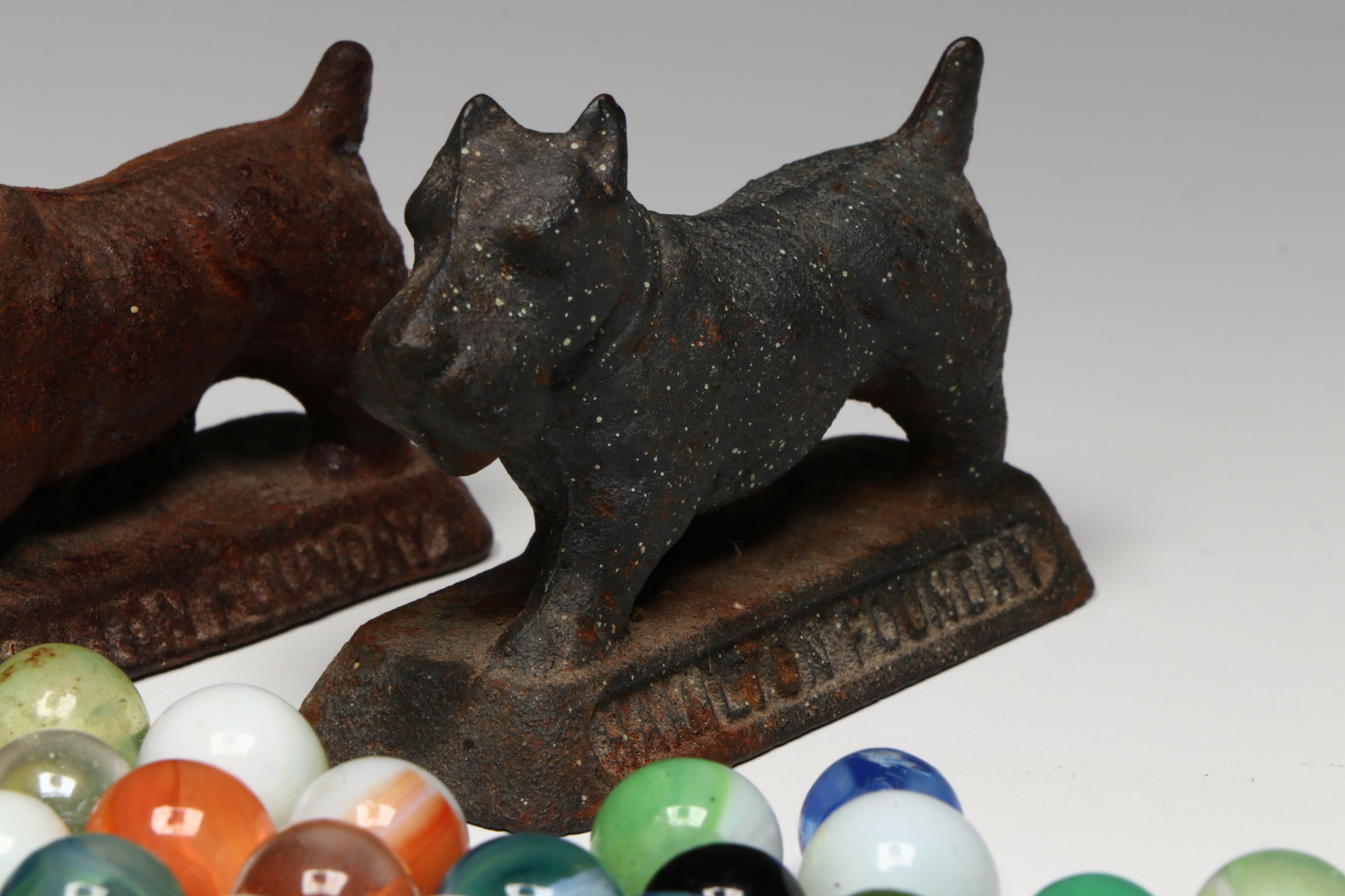Uranium Glass, Cat's Eye and Other Marbles with Cast Iron Dogs and Cat