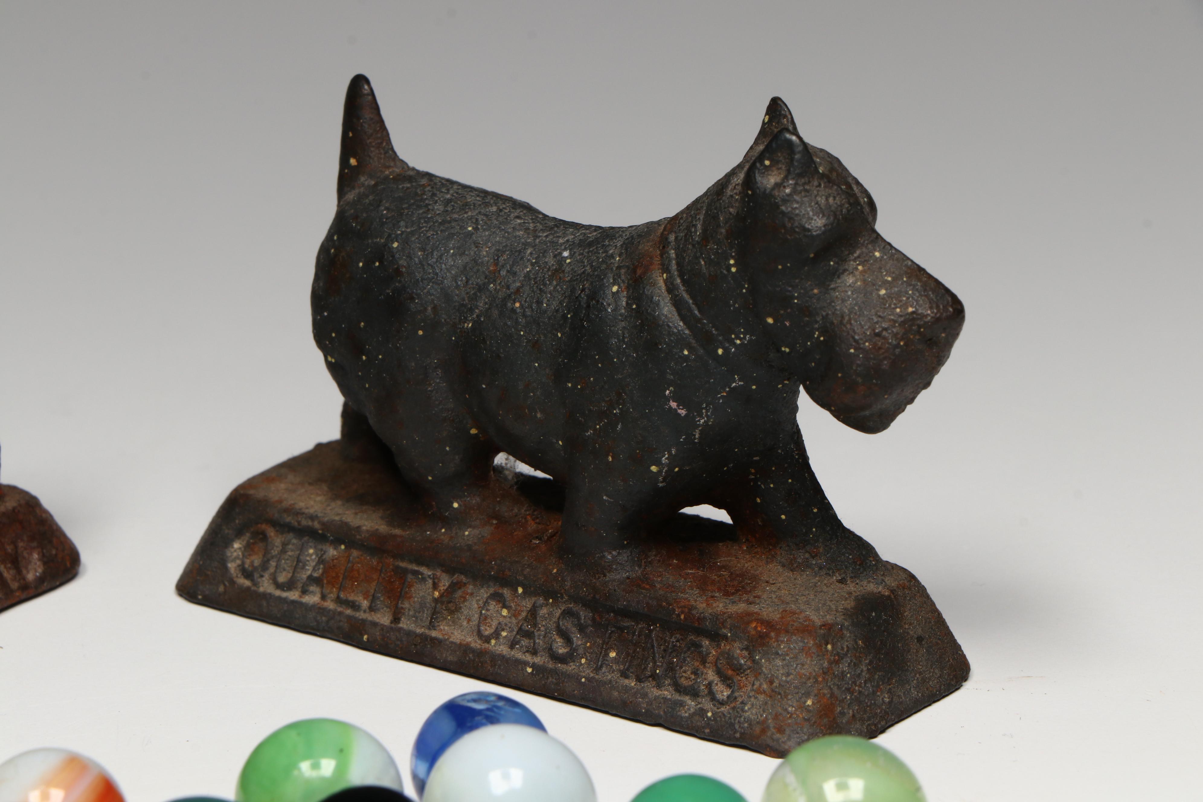 Uranium Glass, Cat's Eye and Other Marbles with Cast Iron Dogs and Cat