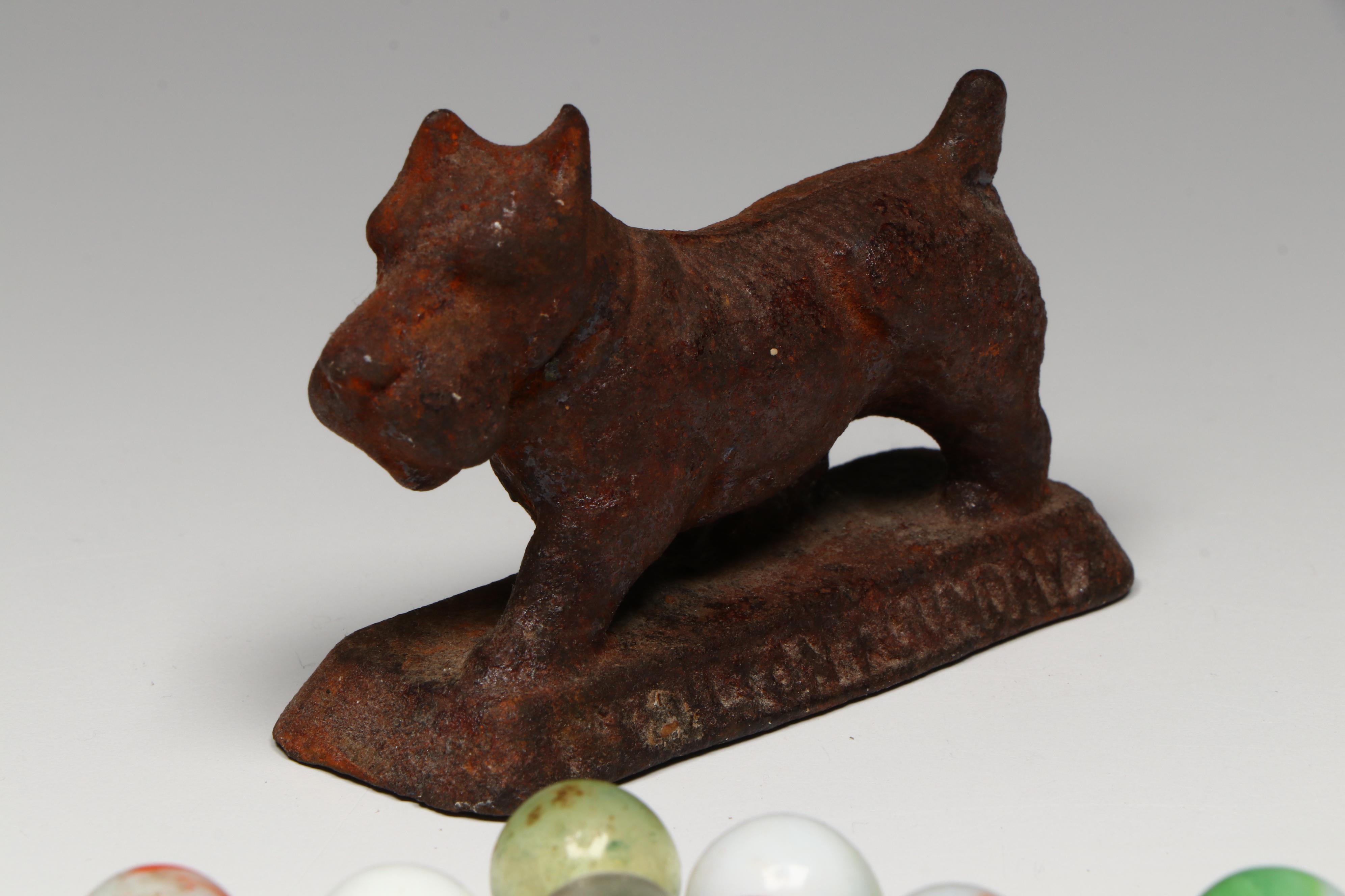 Uranium Glass, Cat's Eye and Other Marbles with Cast Iron Dogs and Cat