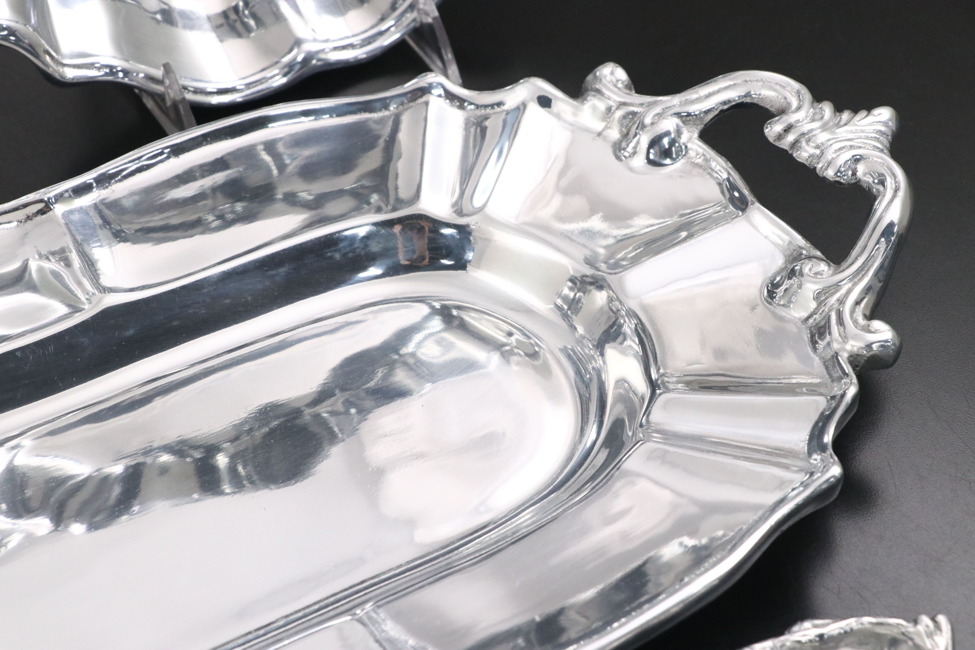 Beatriz Ball and Mariposa Metal Serving Trays with More Metal Serveware