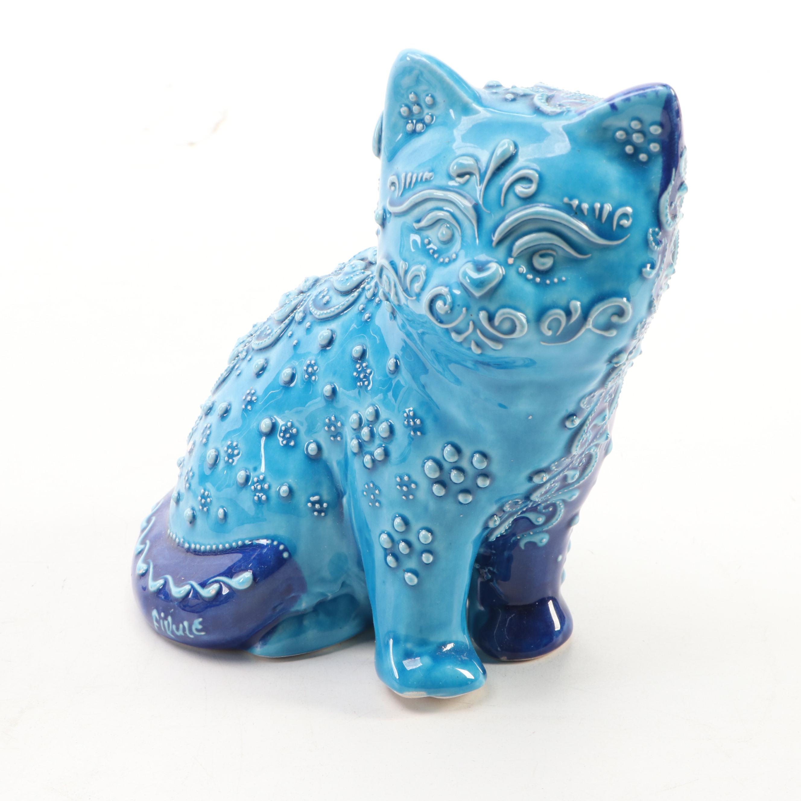 Oriental Rug Pattern Wall Hangers with Evil Eye Amulets and Blue Ceramic Cat