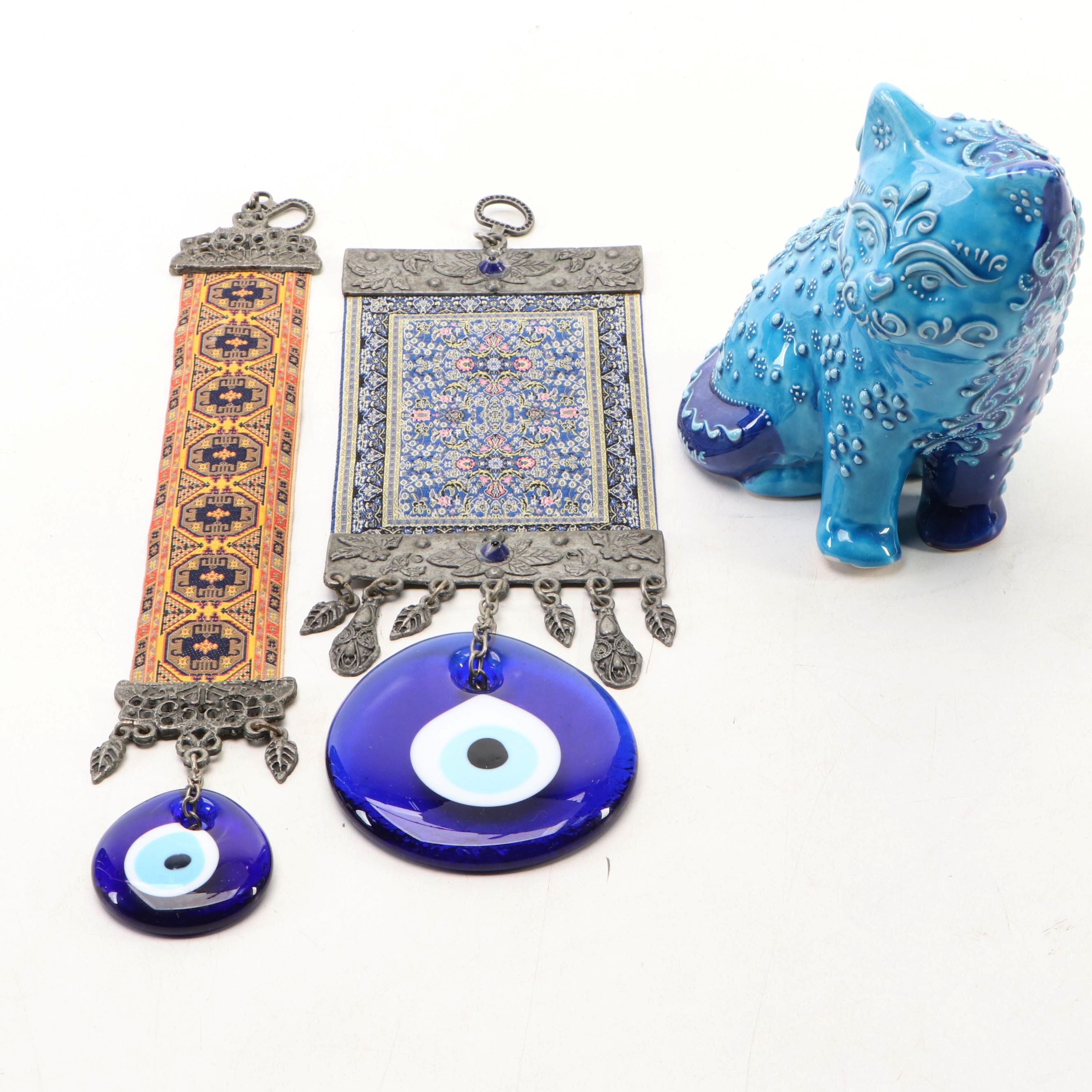 Oriental Rug Pattern Wall Hangers with Evil Eye Amulets and Blue Ceramic Cat