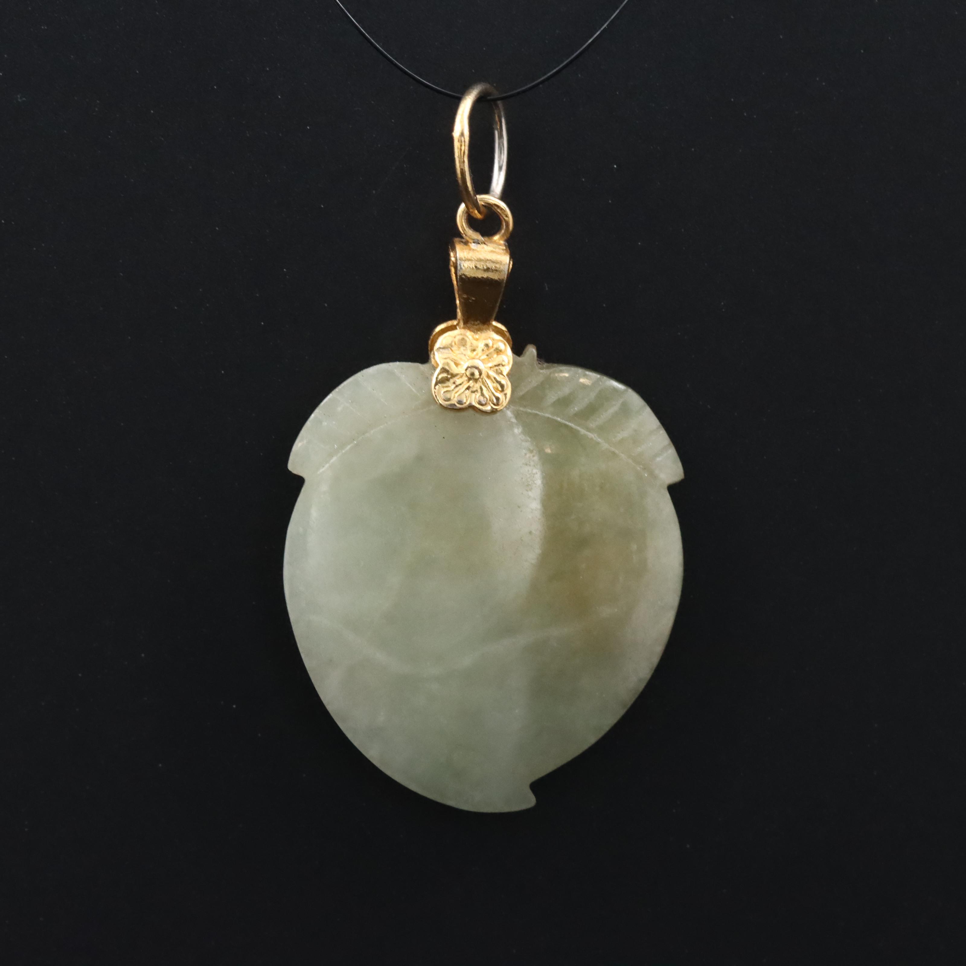 Carved Jadeite Pendant