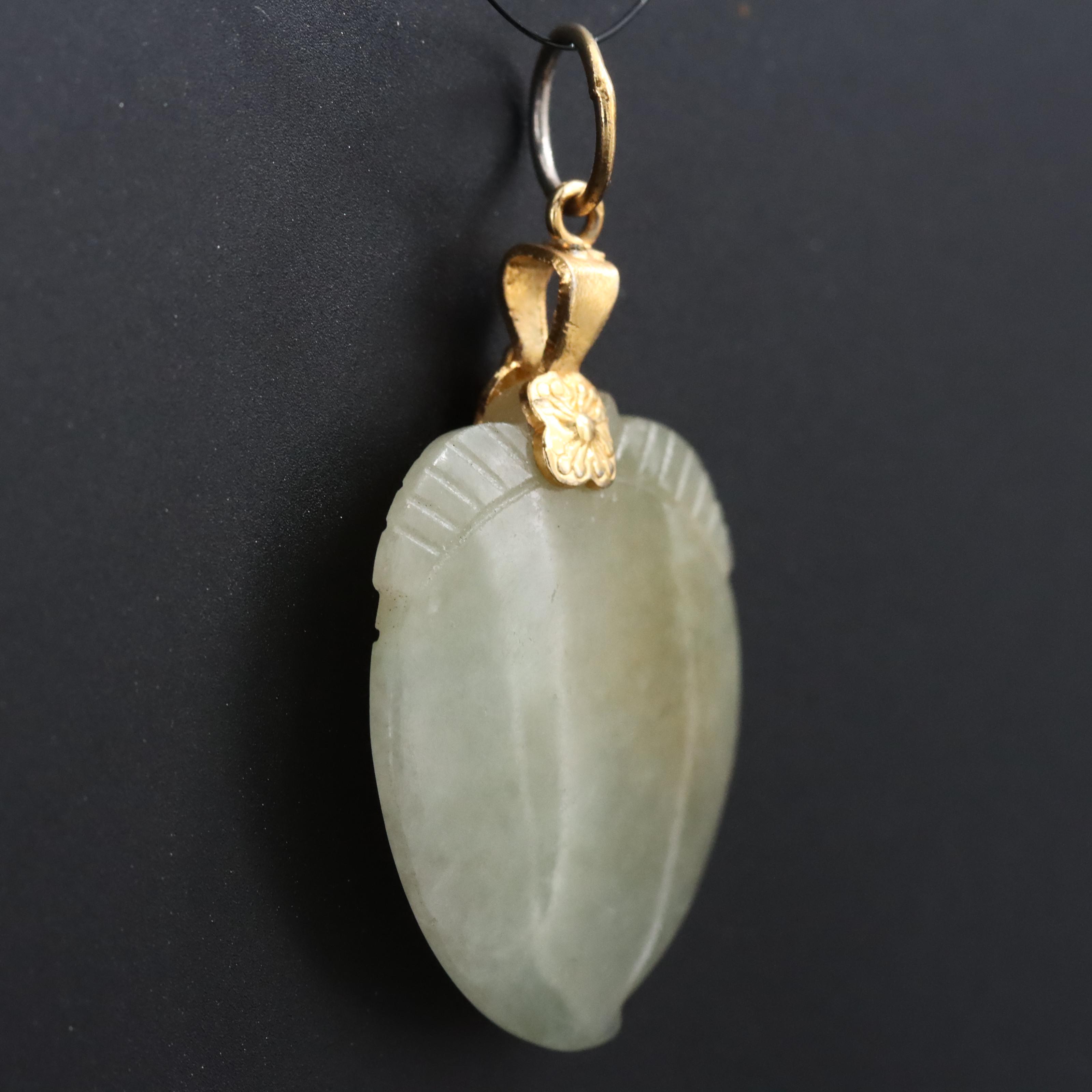 Carved Jadeite Pendant