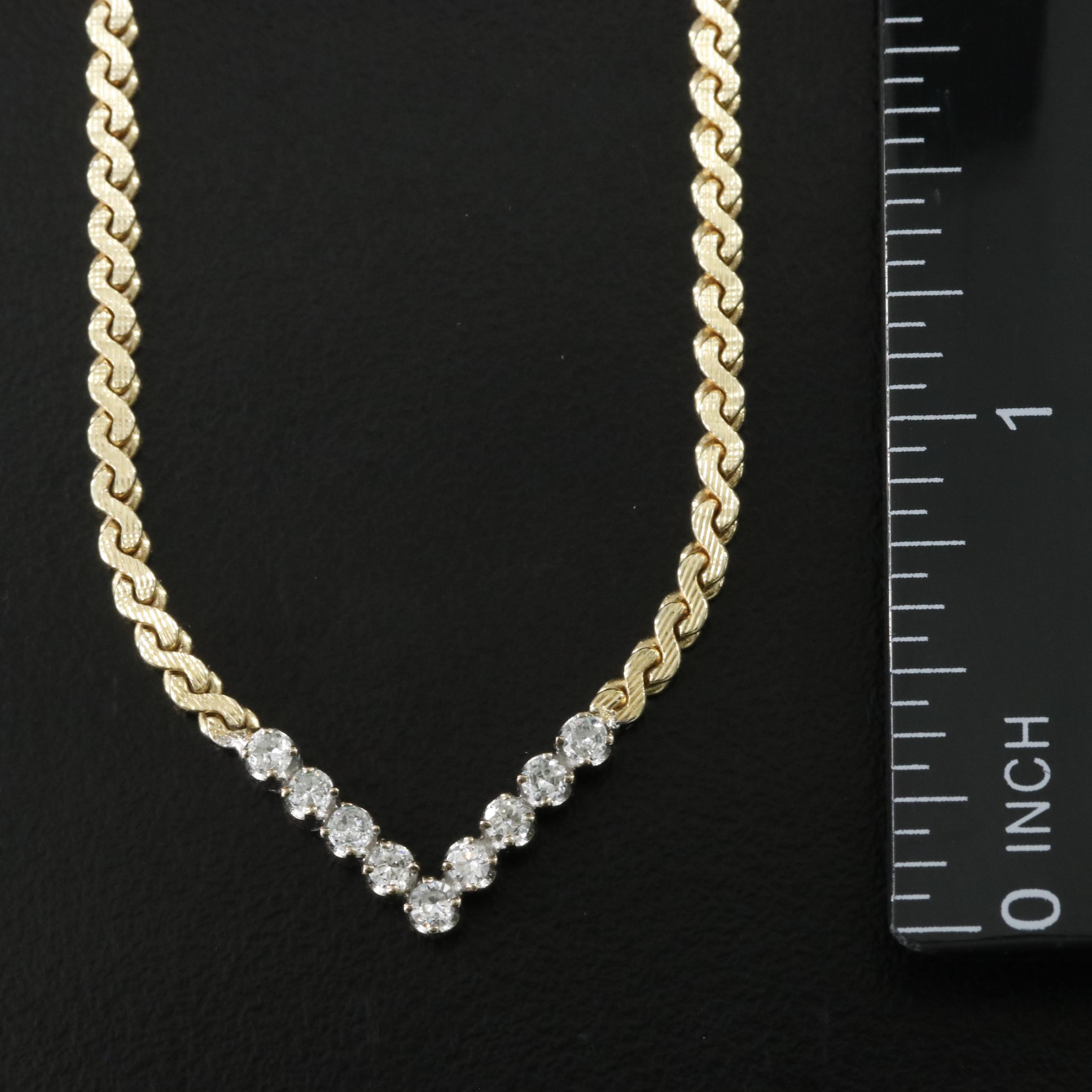 10K 0.36 CTW Diamond Station on 14K Serpentine Necklace