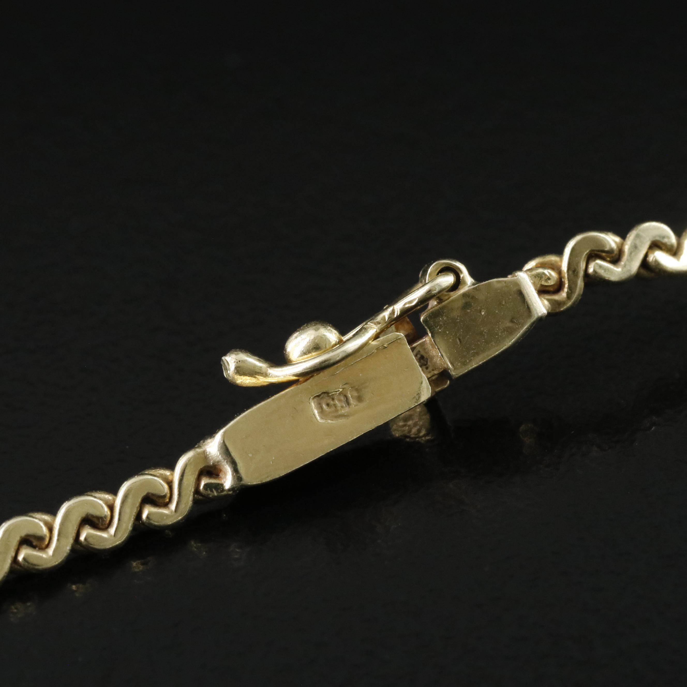 10K 0.36 CTW Diamond Station on 14K Serpentine Necklace