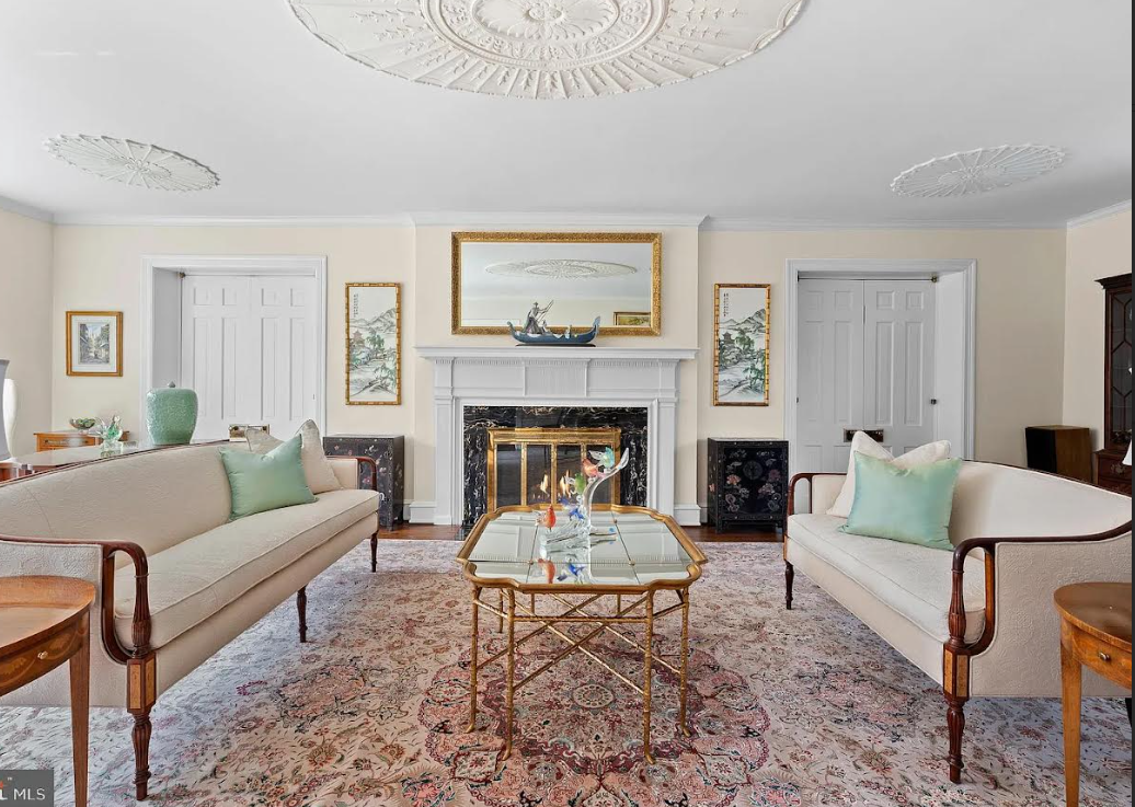 Pair of Chinese Paint Decorated Black Lacquered Cabinets, 20th Century