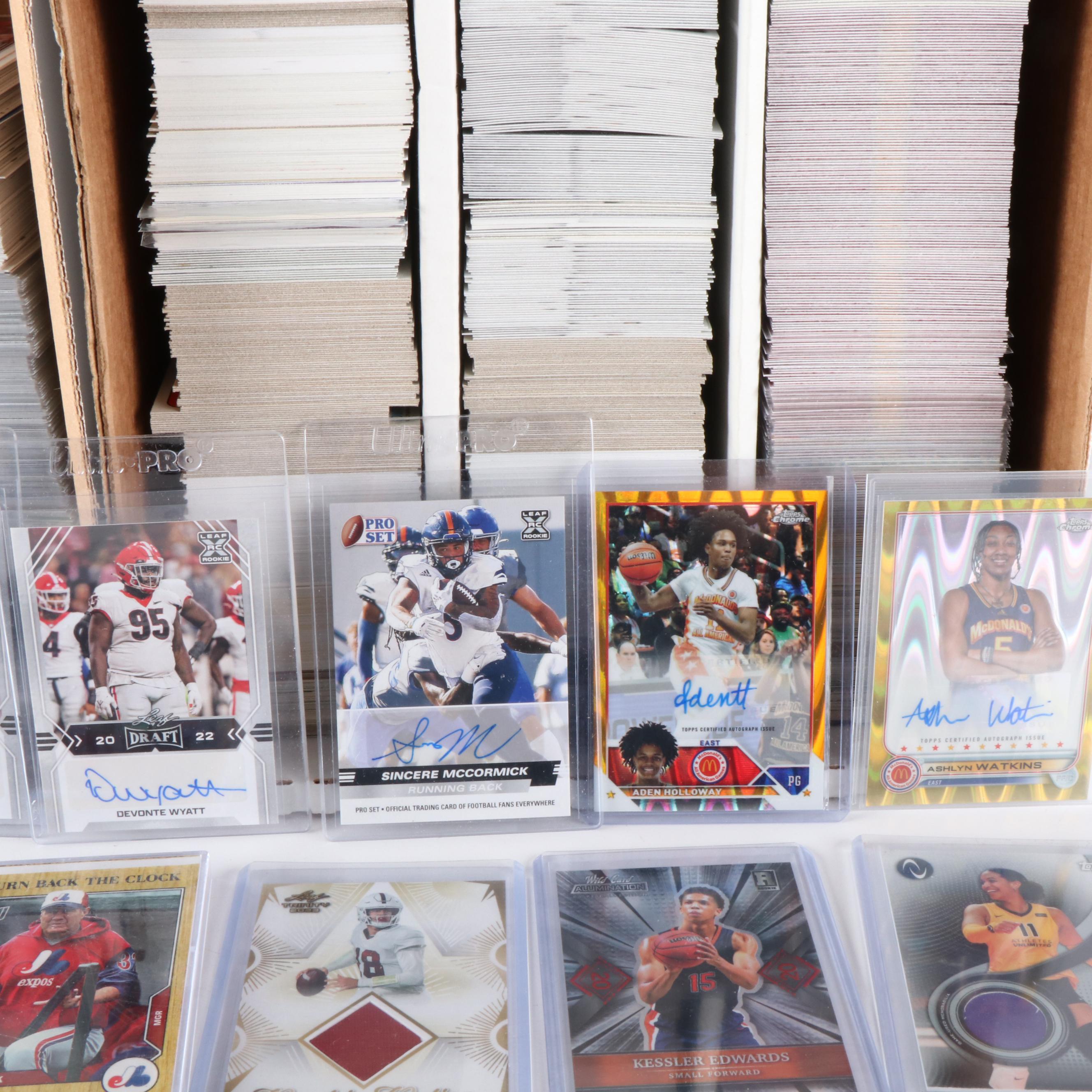 Select with Other Sports Cards Featuring Peyton Manning, Ken Griffey Jr., & More