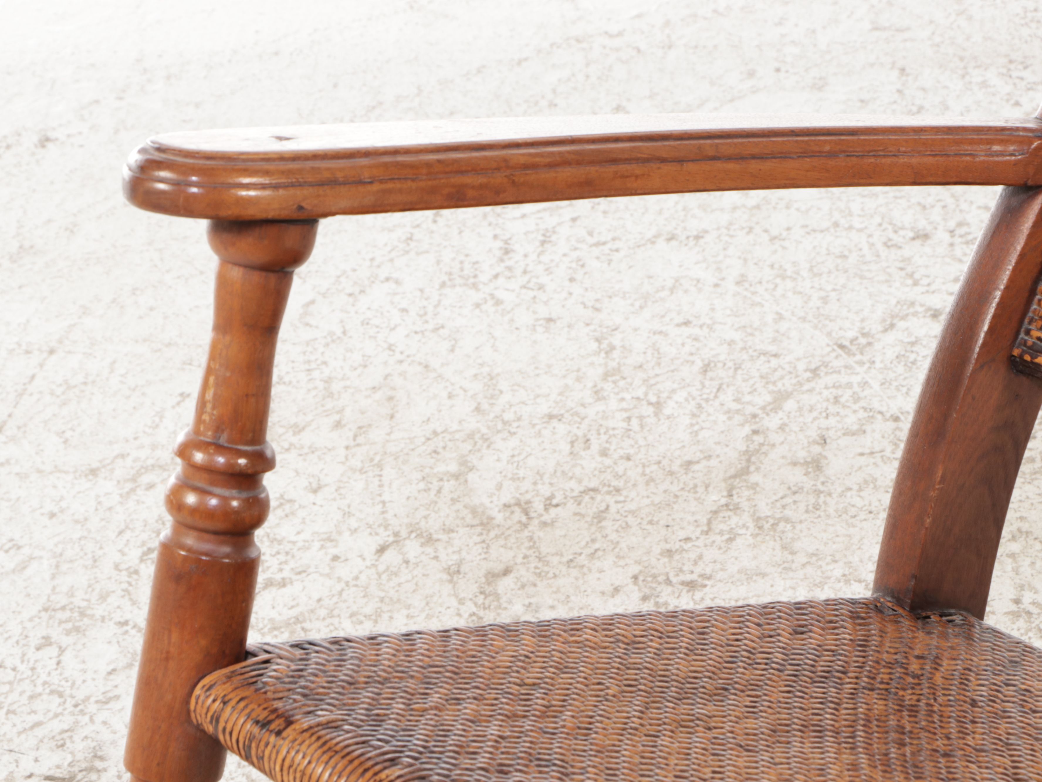 Victorian East Lake Rattan and Carved Walnut Rocking Chair