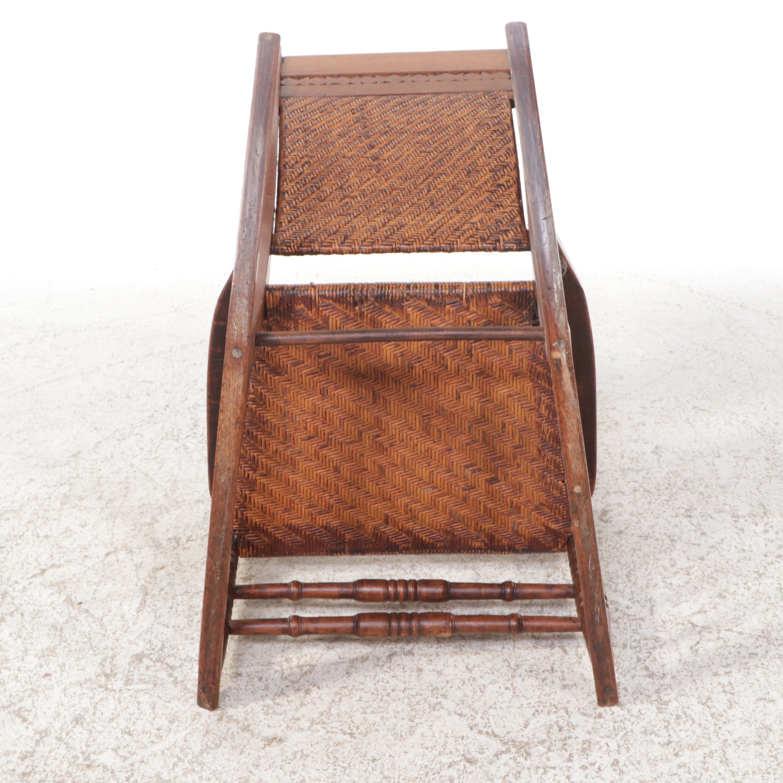 Victorian East Lake Rattan and Carved Walnut Rocking Chair