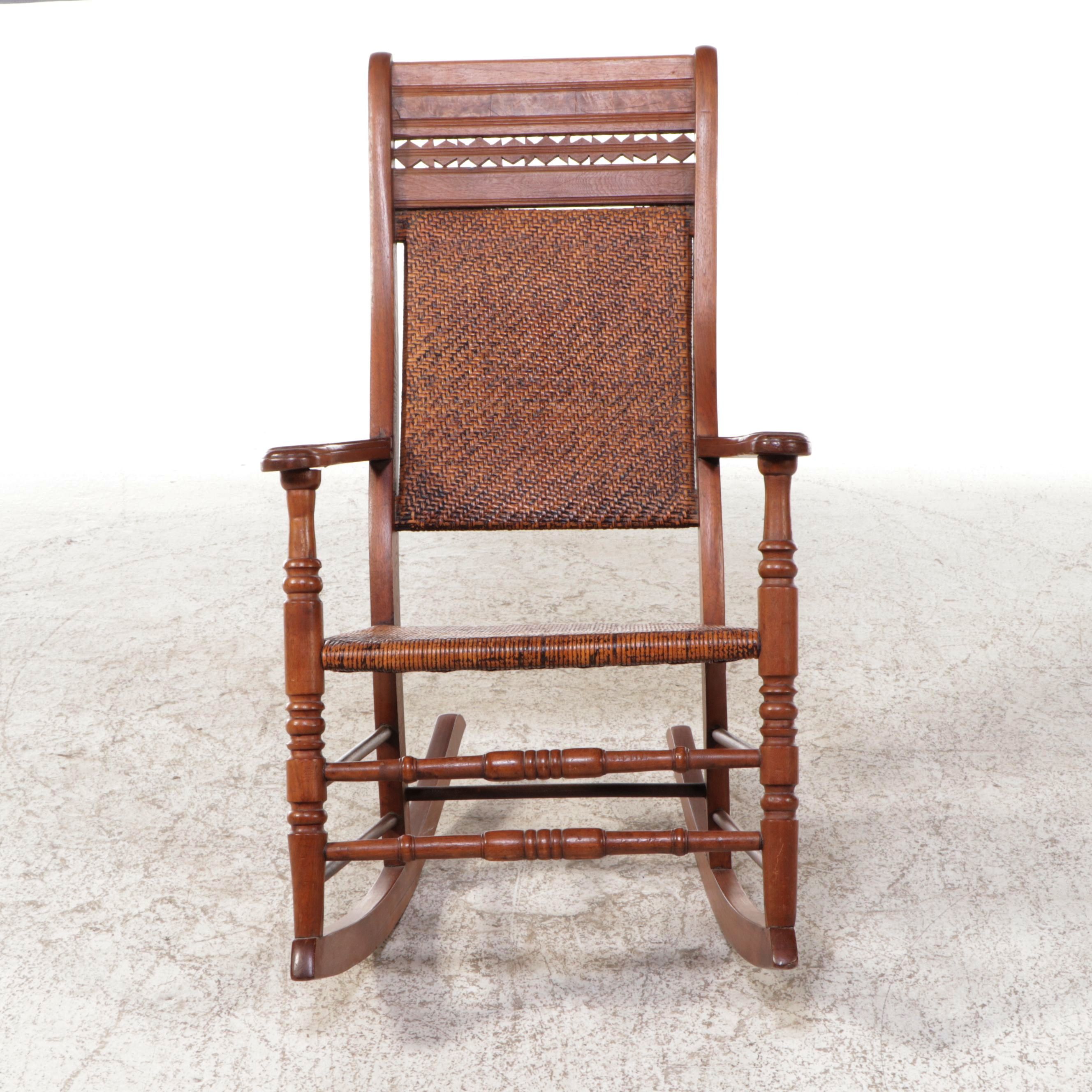 Victorian East Lake Rattan and Carved Walnut Rocking Chair