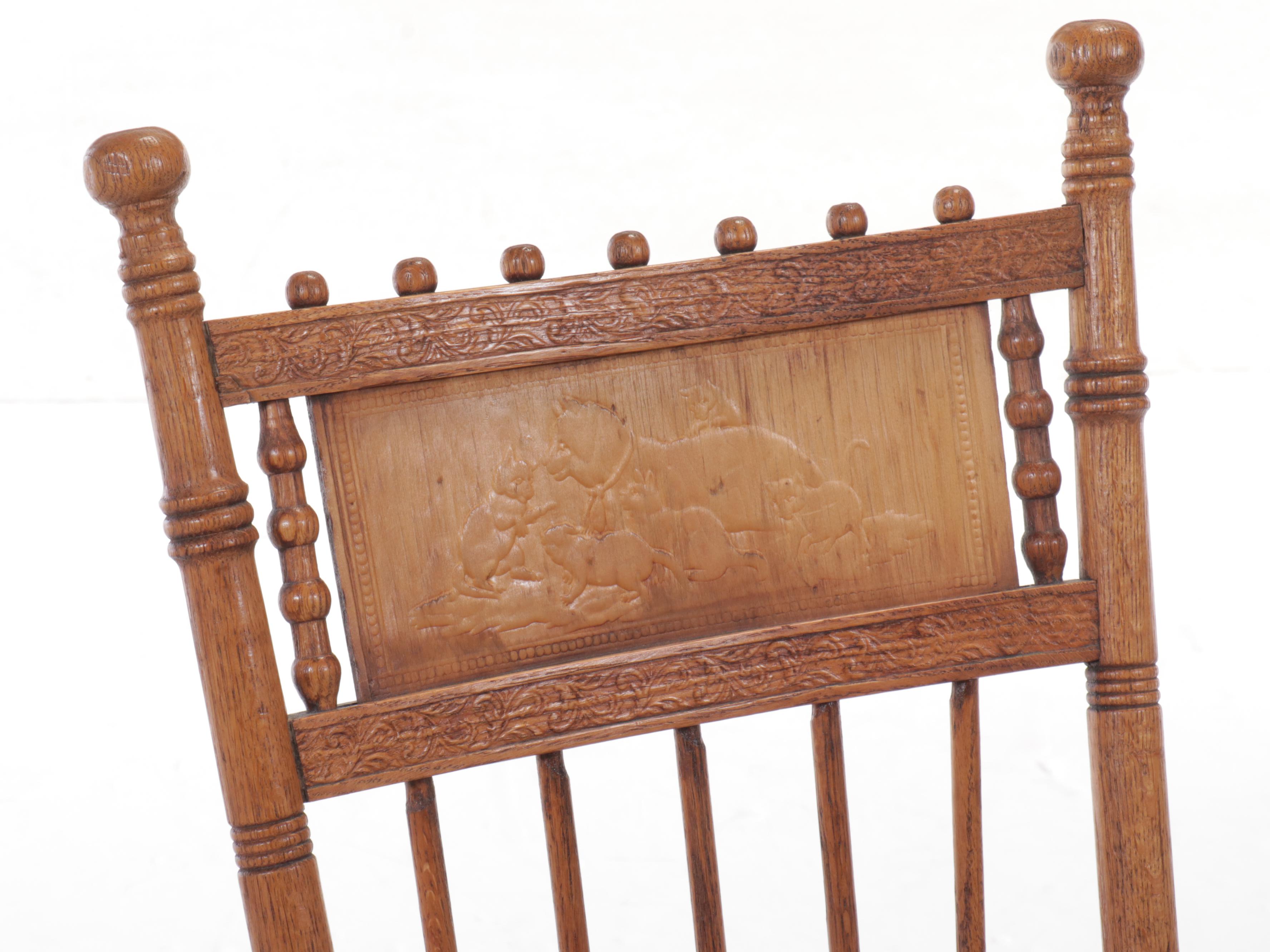 Victorian Press Carved Oak Rocking Chair with Needlepoint Seat