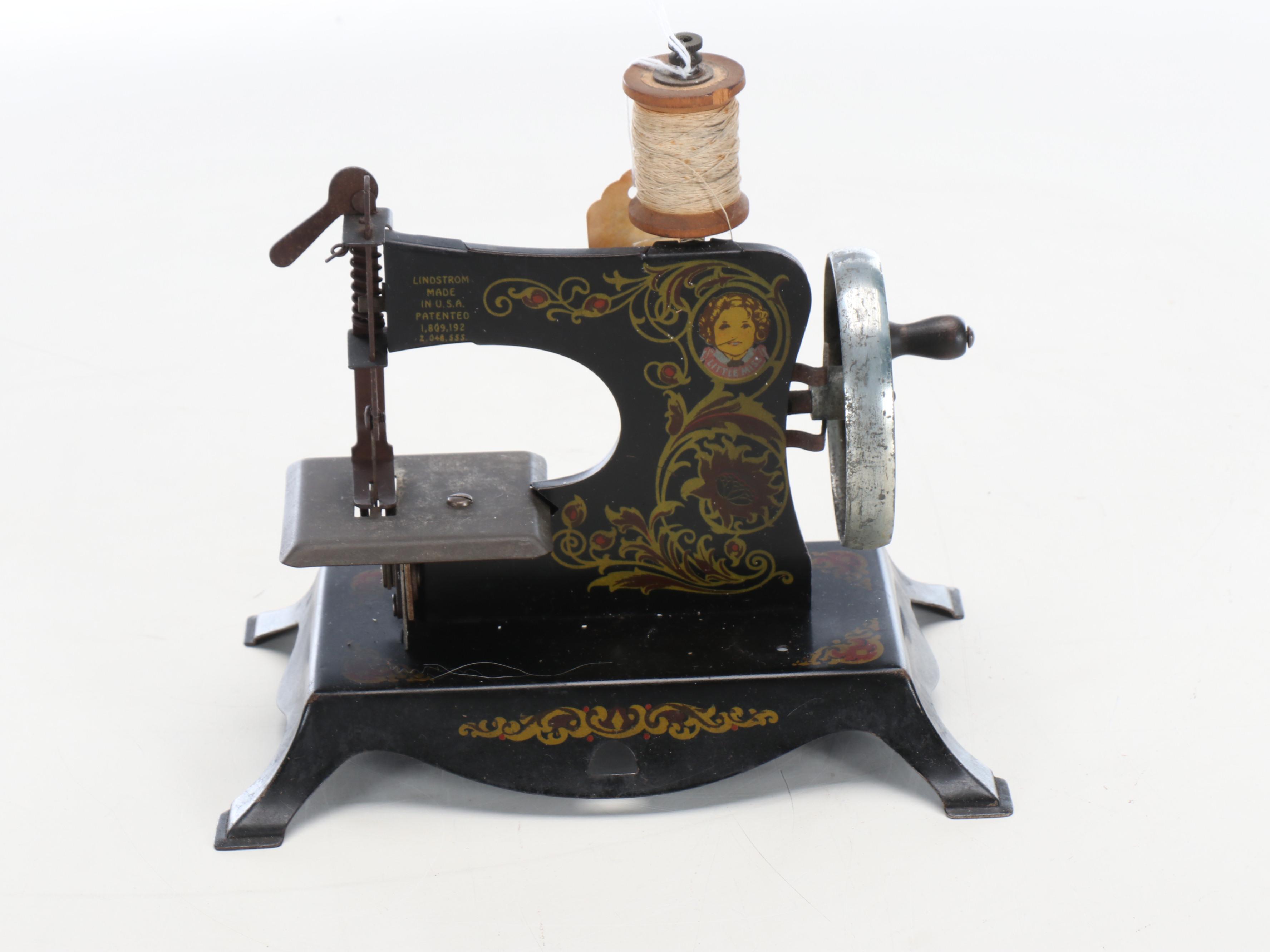 Clark's Embroidery Cabinet with Lindstrom Metal Toy Sewing Machine
