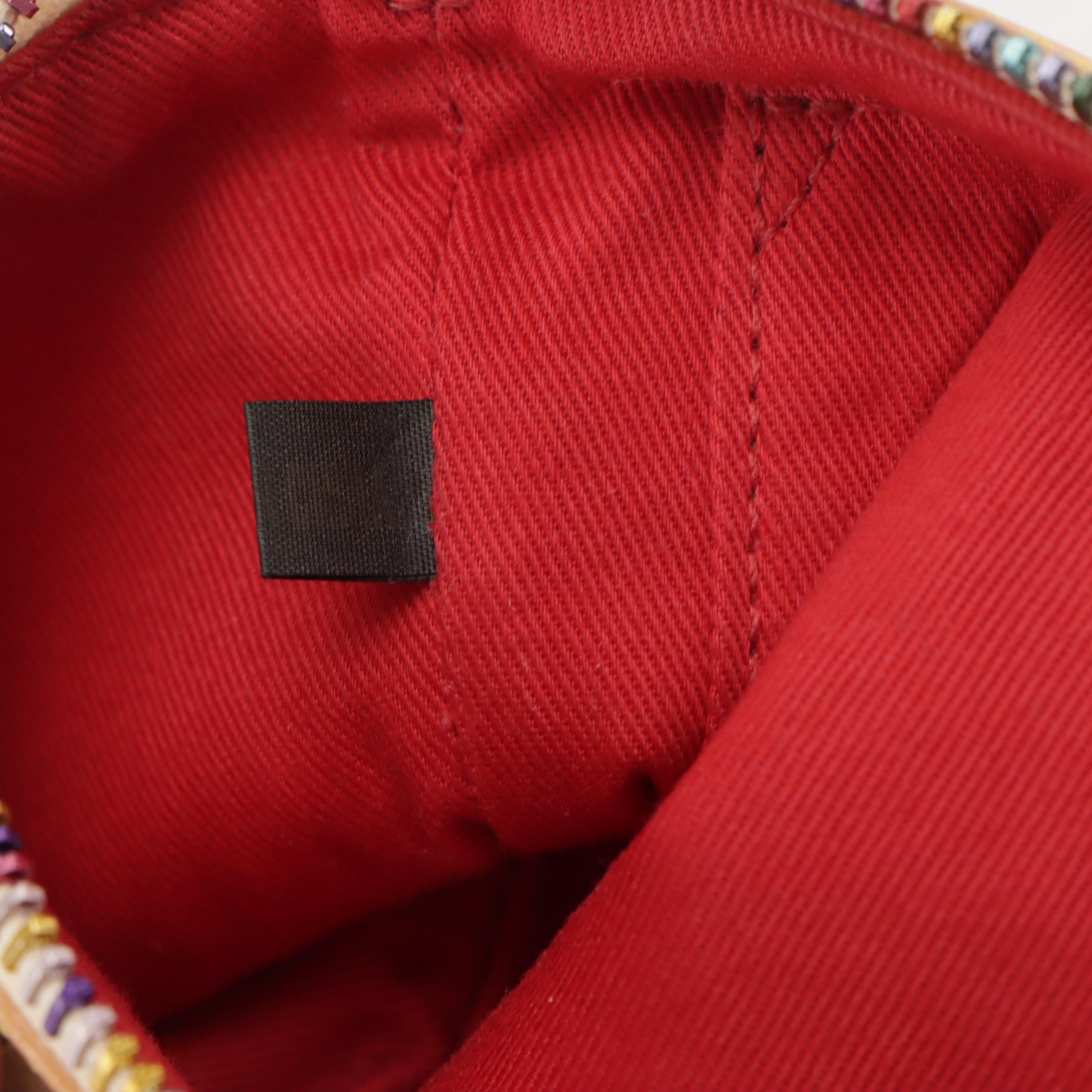 Dooney & Bourke Wristlet and Crossbody Bags in Logo/Striped Coated Canvas