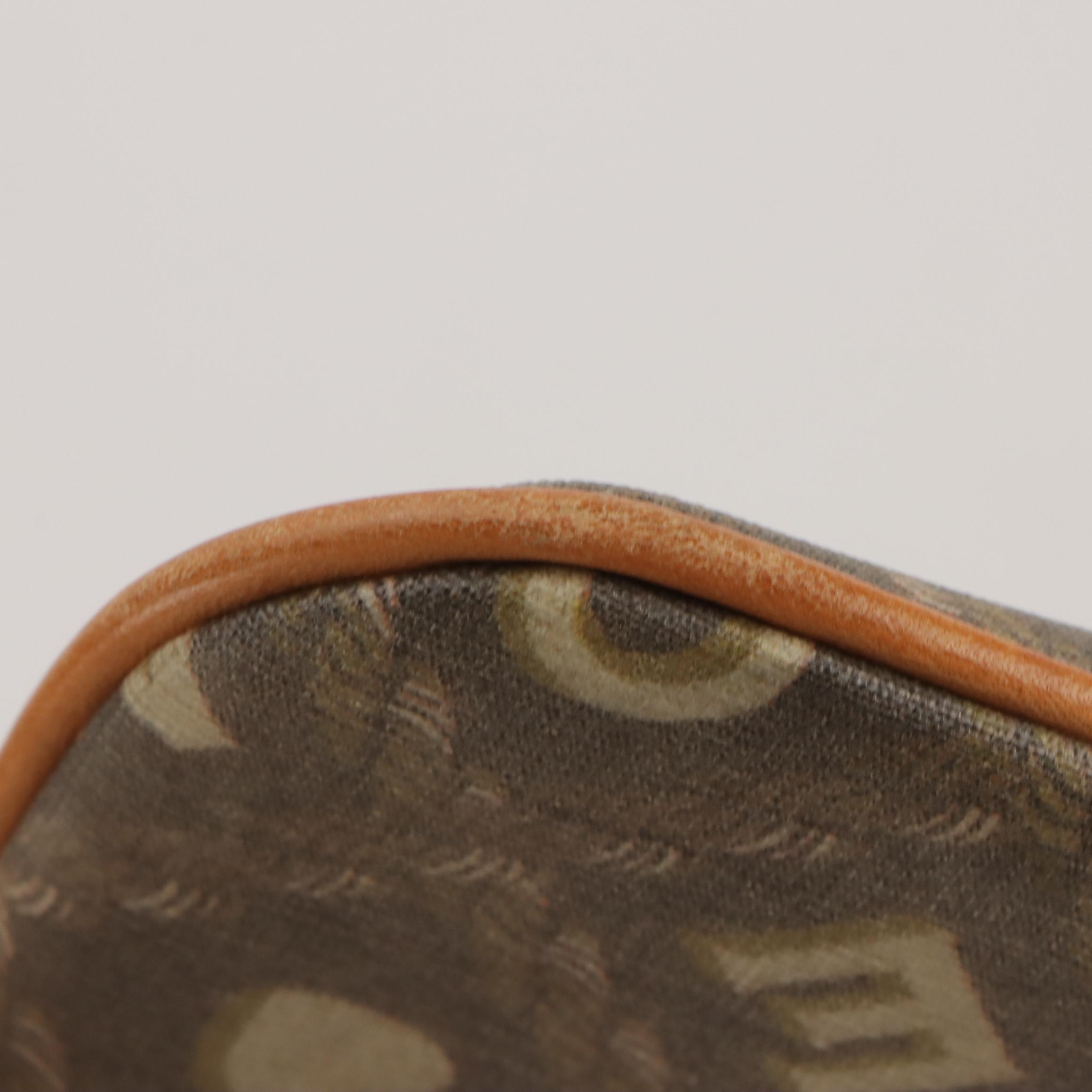 Dooney & Bourke Wristlet and Crossbody Bags in Logo/Striped Coated Canvas