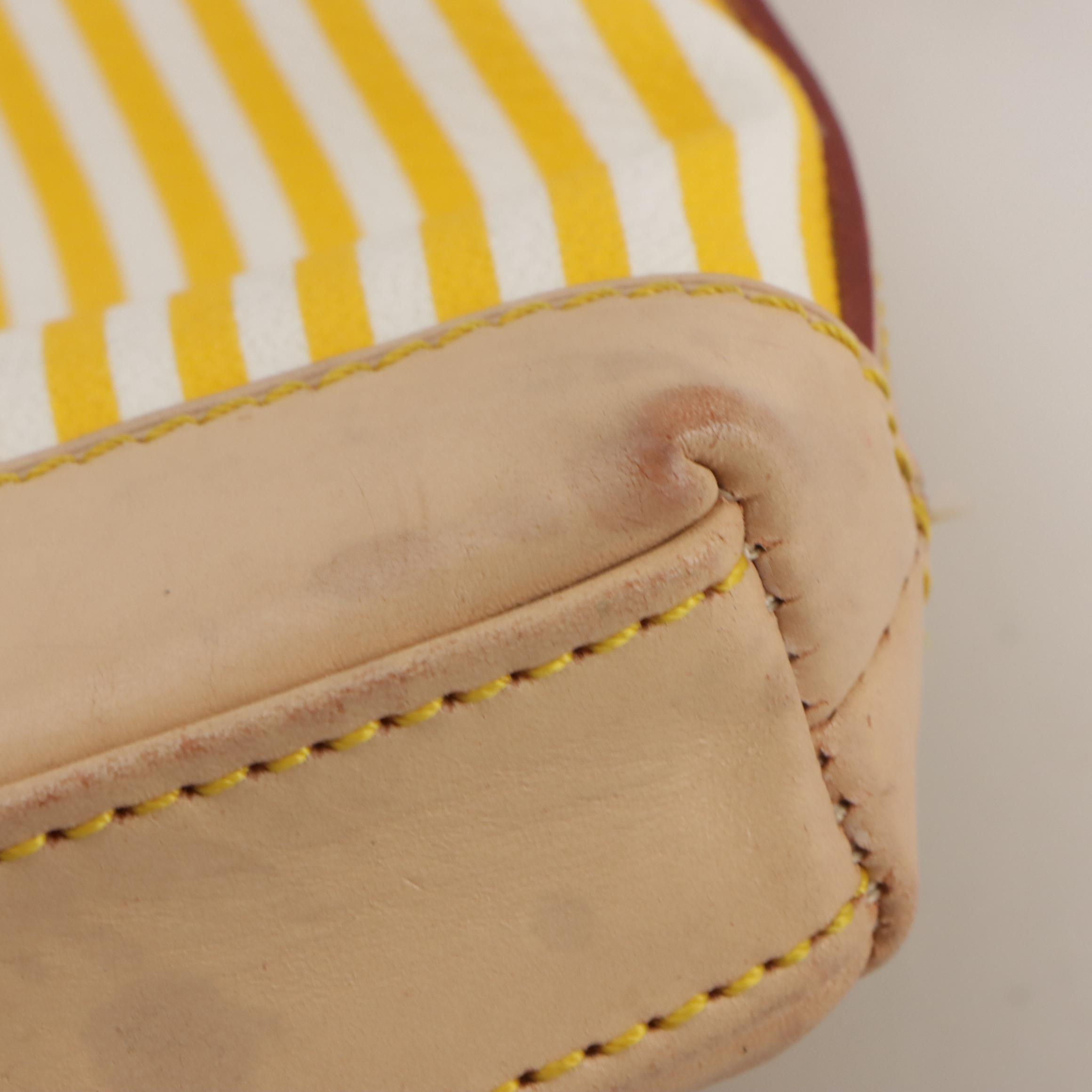 Dooney & Bourke Wristlet and Crossbody Bags in Logo/Striped Coated Canvas