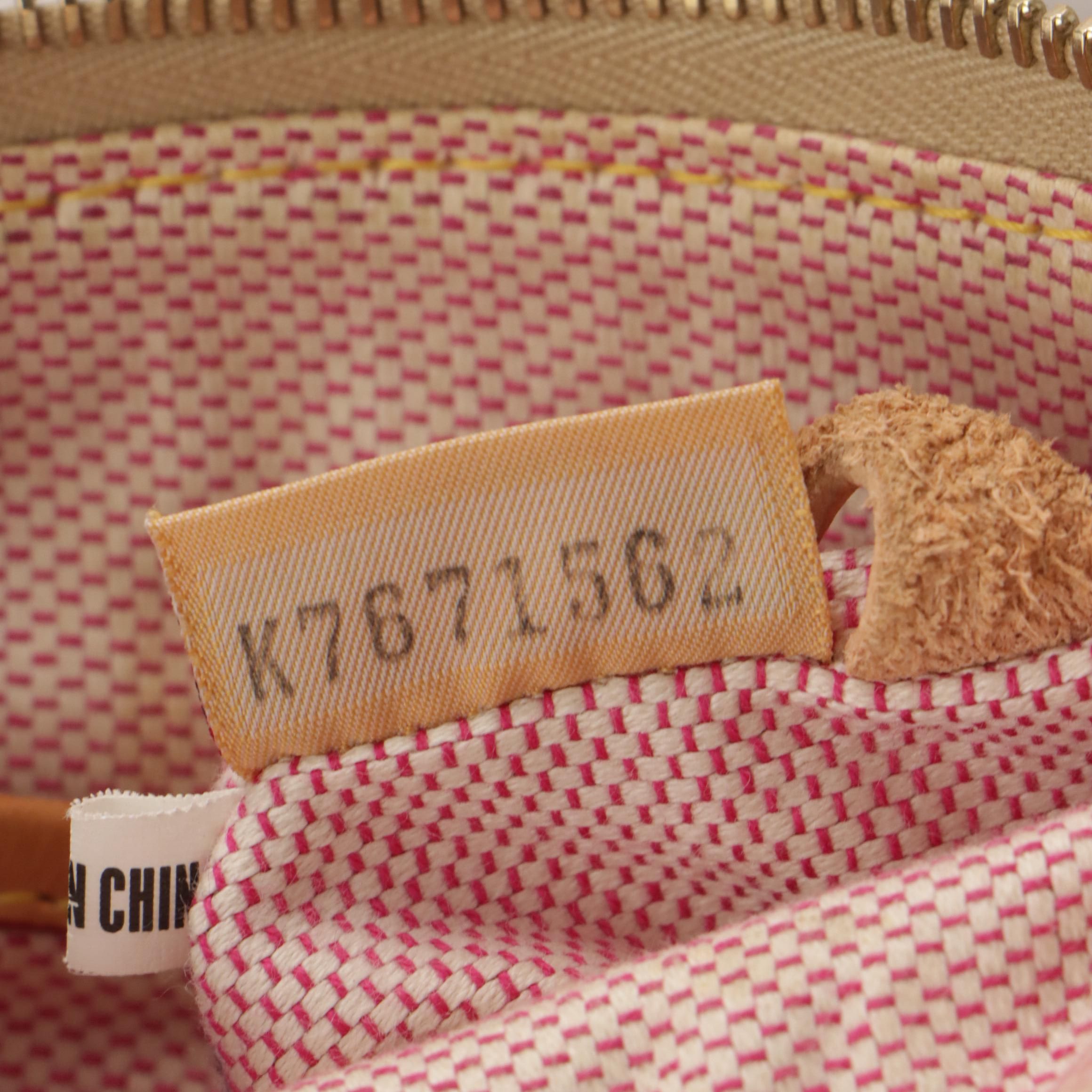 Dooney & Bourke Wristlet and Crossbody Bags in Logo/Striped Coated Canvas