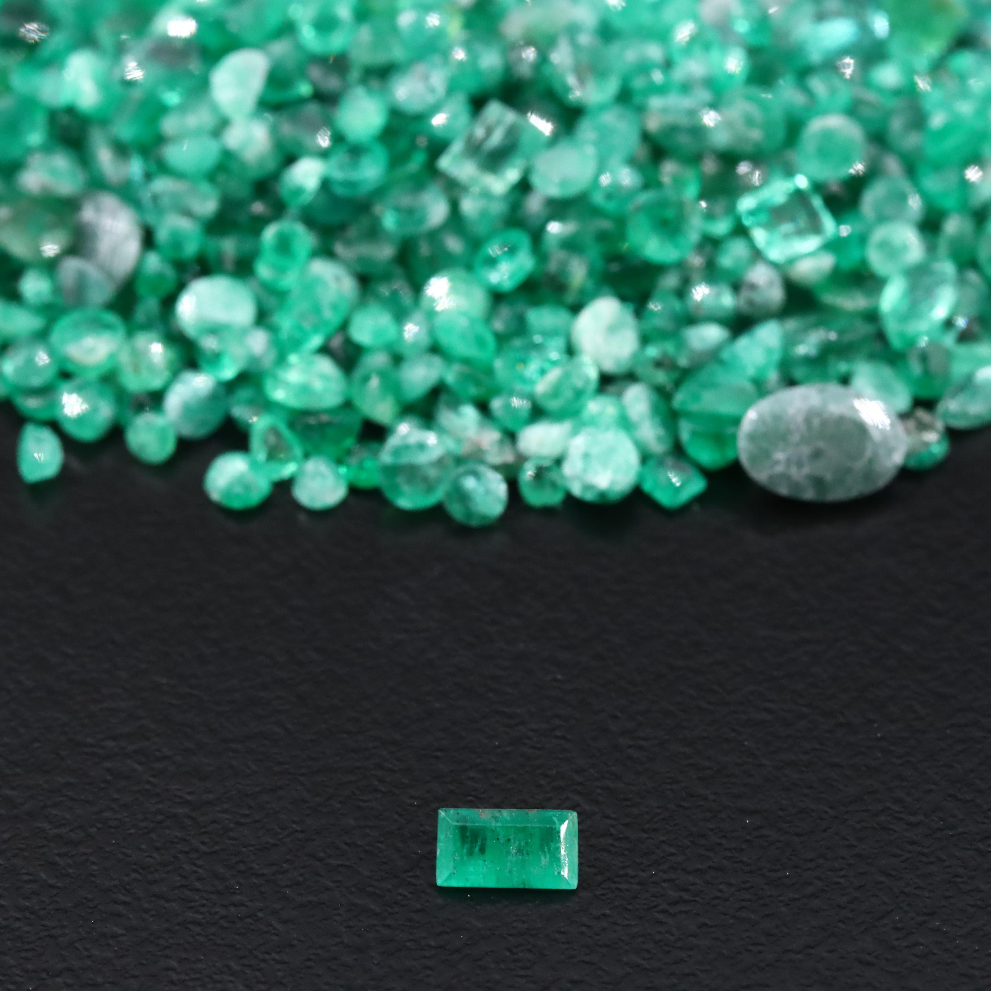 Loose 50.40 CTW Gemstone Lot Including Emerald and Chalcedony