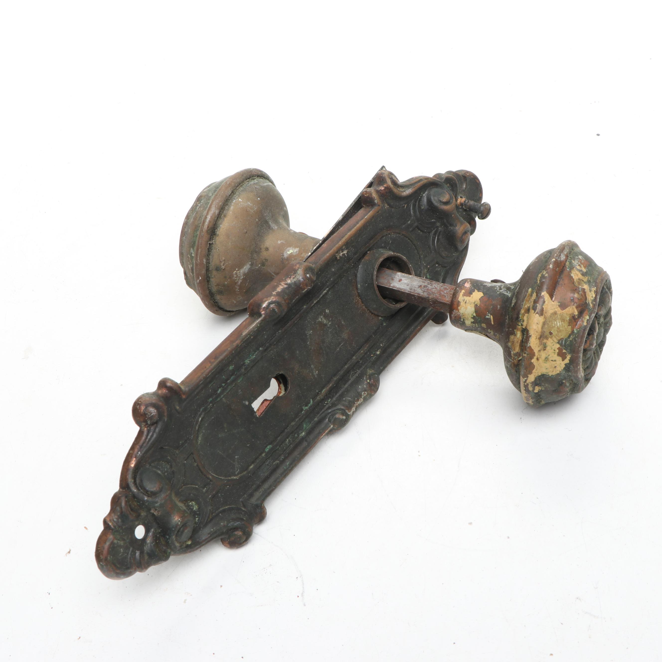 Assortment of Vintage Brass, Metal, and Wood Doorknobs with Cast Iron Locks