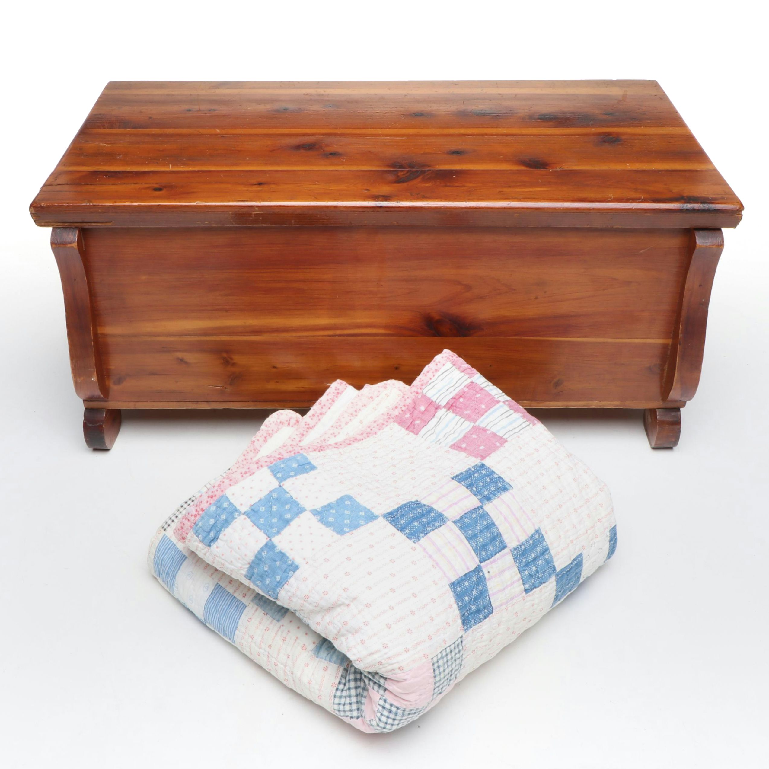 Cedar Chest with Child's Patchwork Quilt