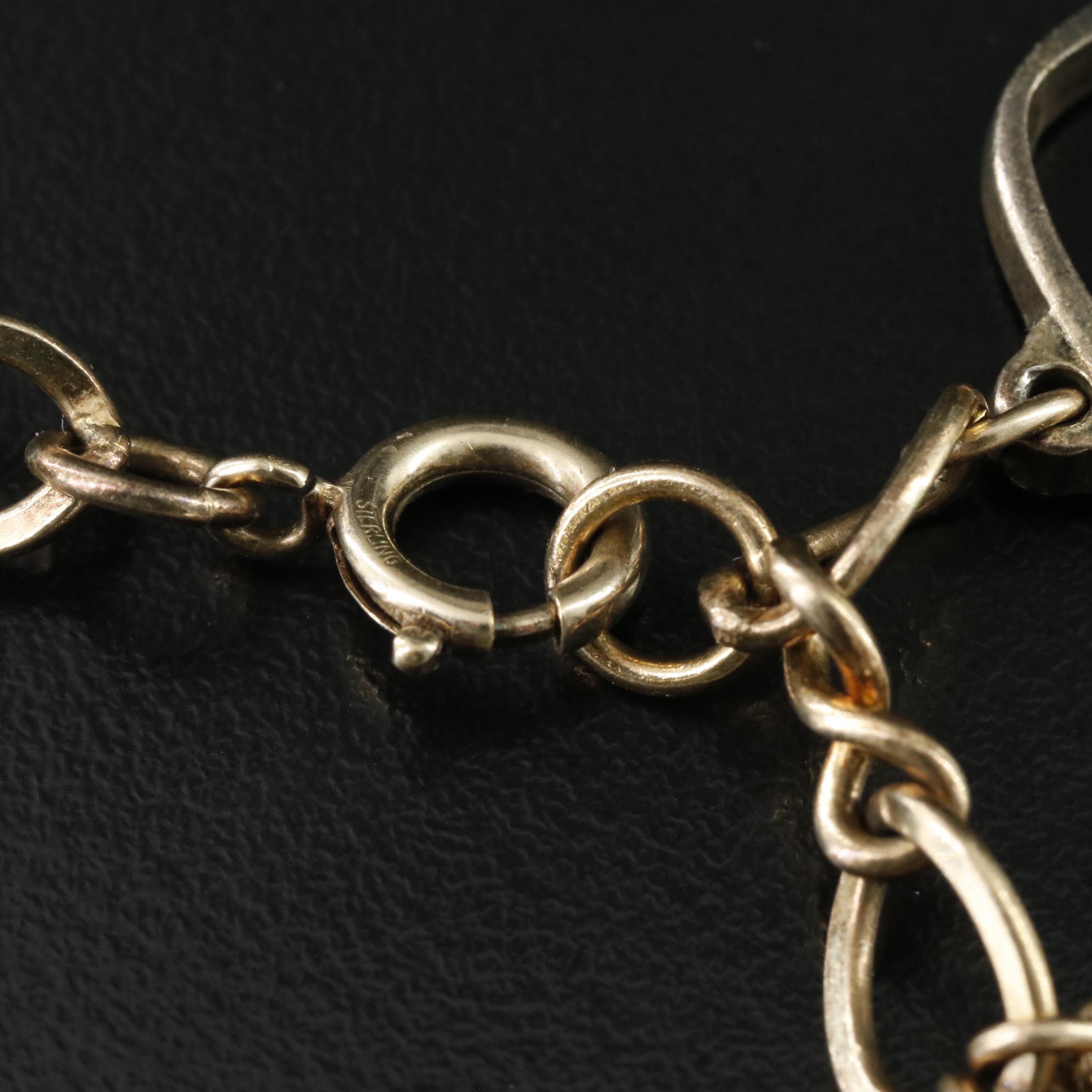1970s Sterling Charm Bracelet Including 10K and Gold-Filled