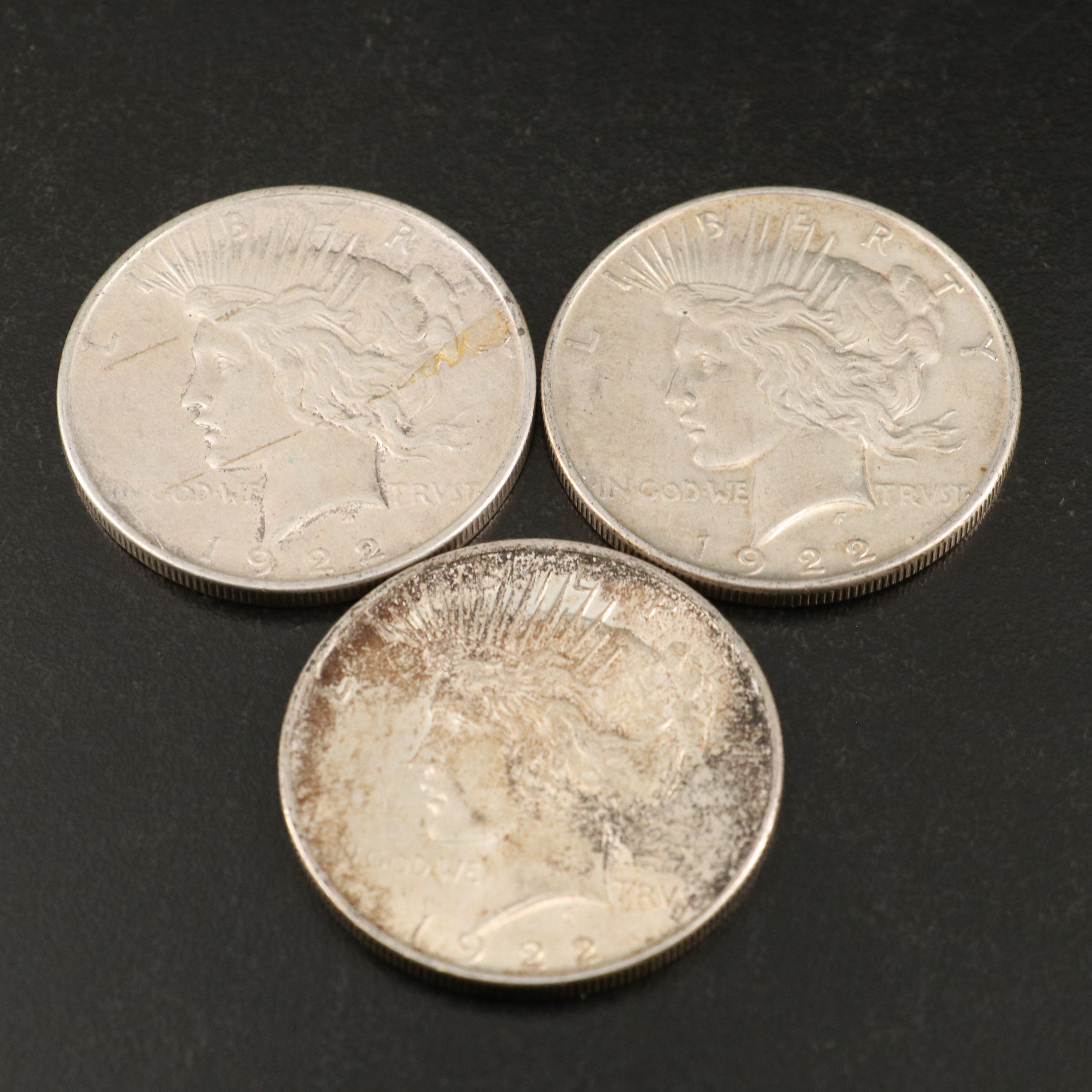 Eleven Peace Silver Dollars