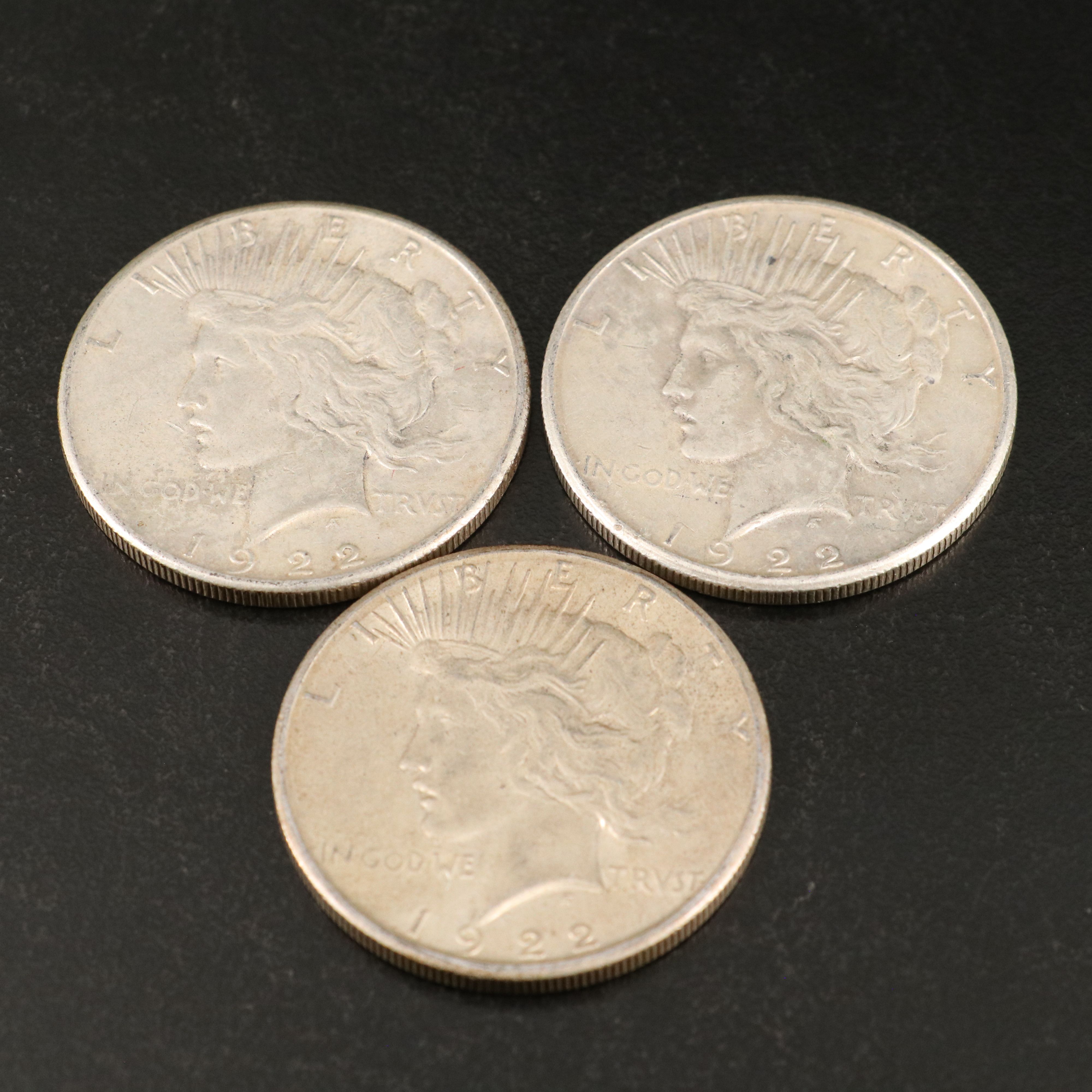 Eleven Peace Silver Dollars