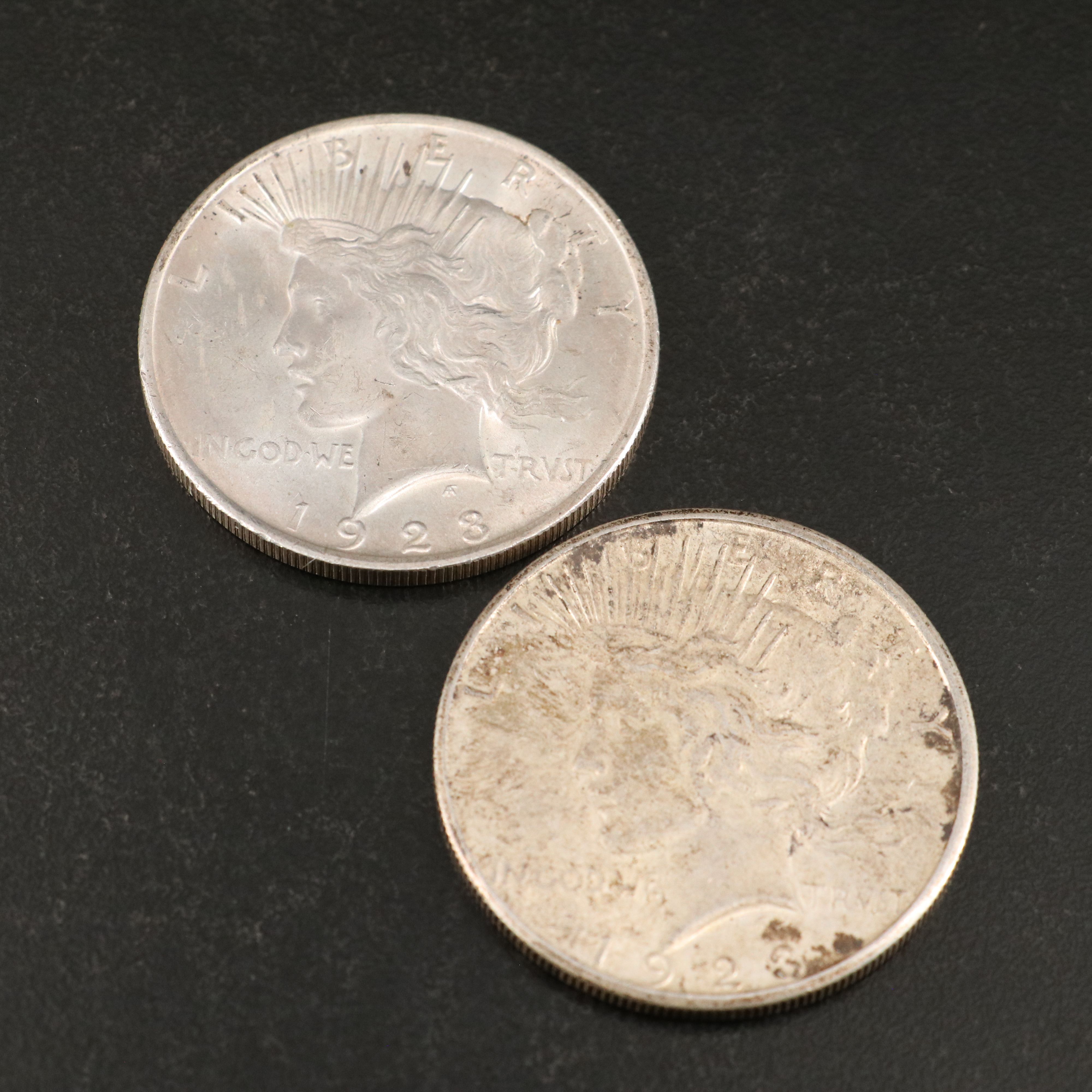 Eleven Peace Silver Dollars