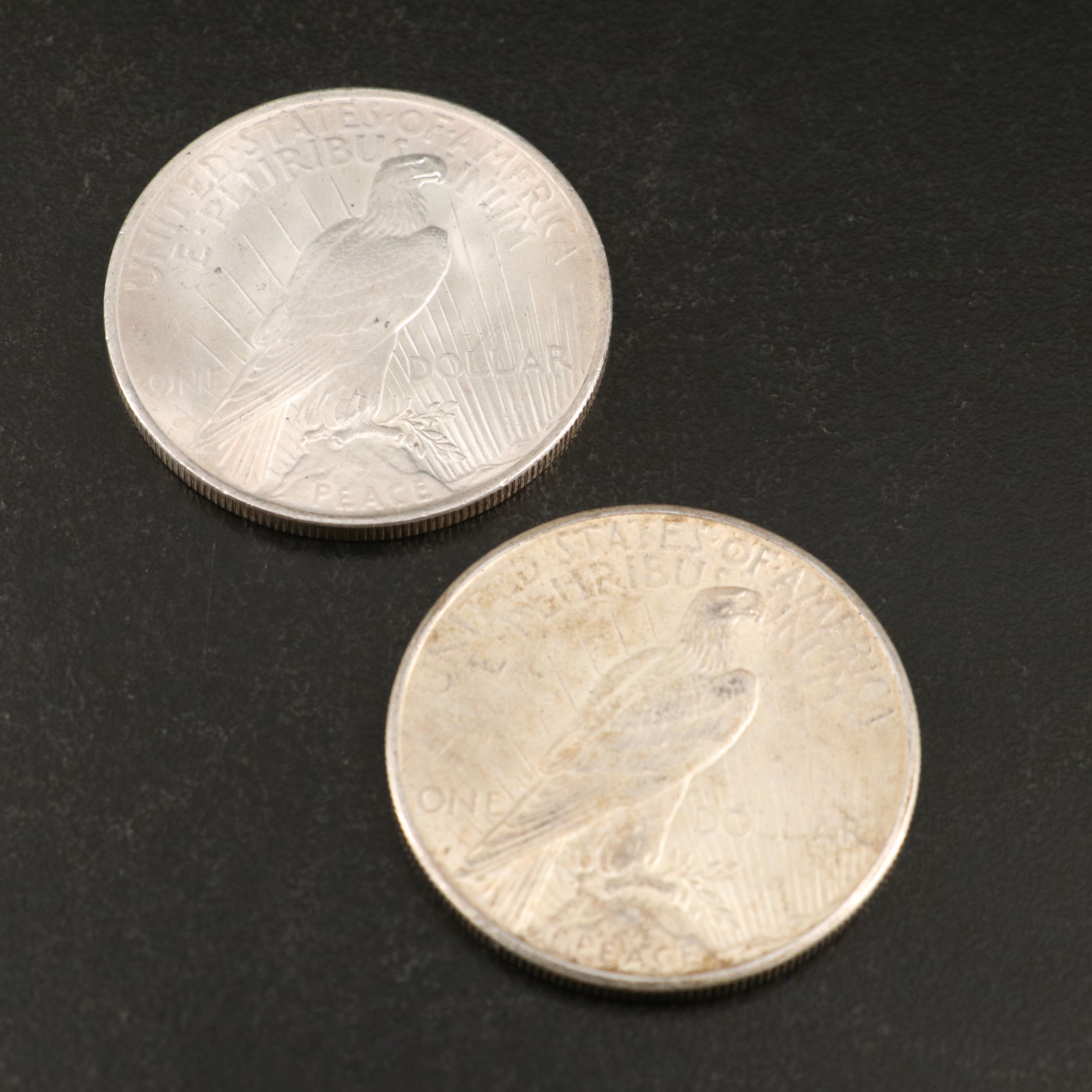Eleven Peace Silver Dollars