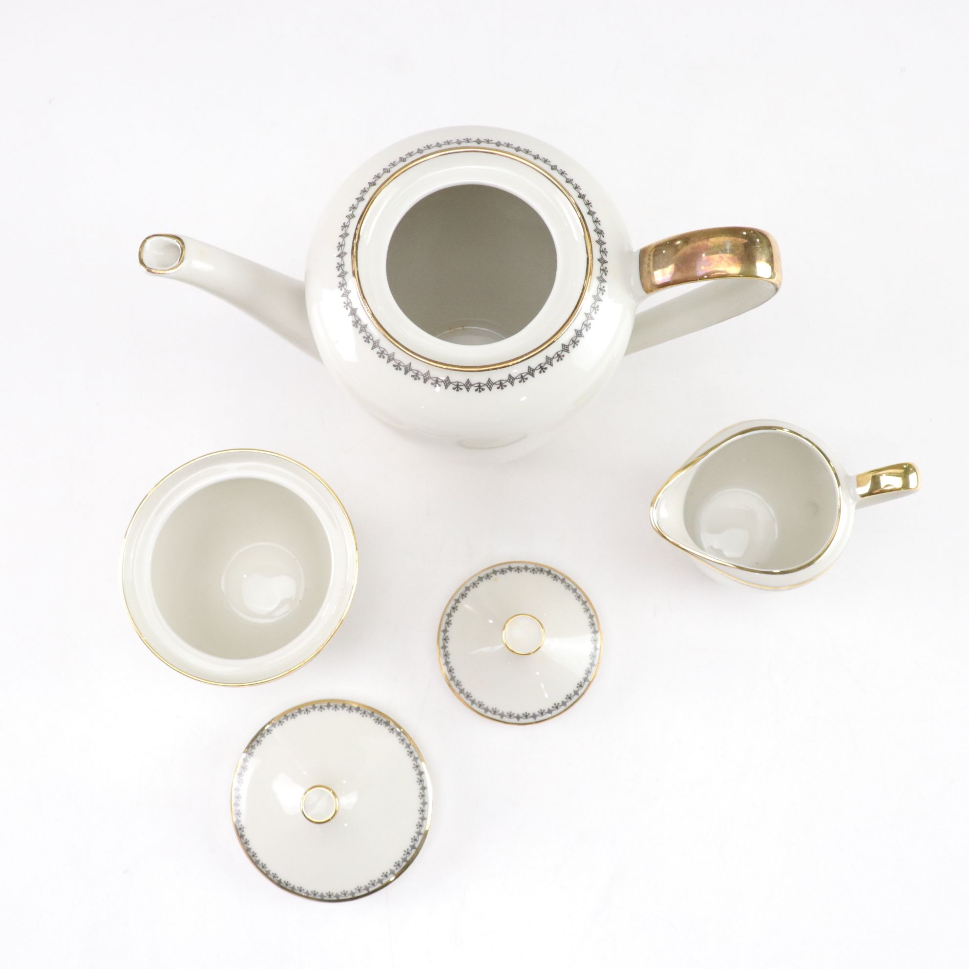 Bavarian Elfenbein Porzellan Gilt Porcelain Tea Set for Two