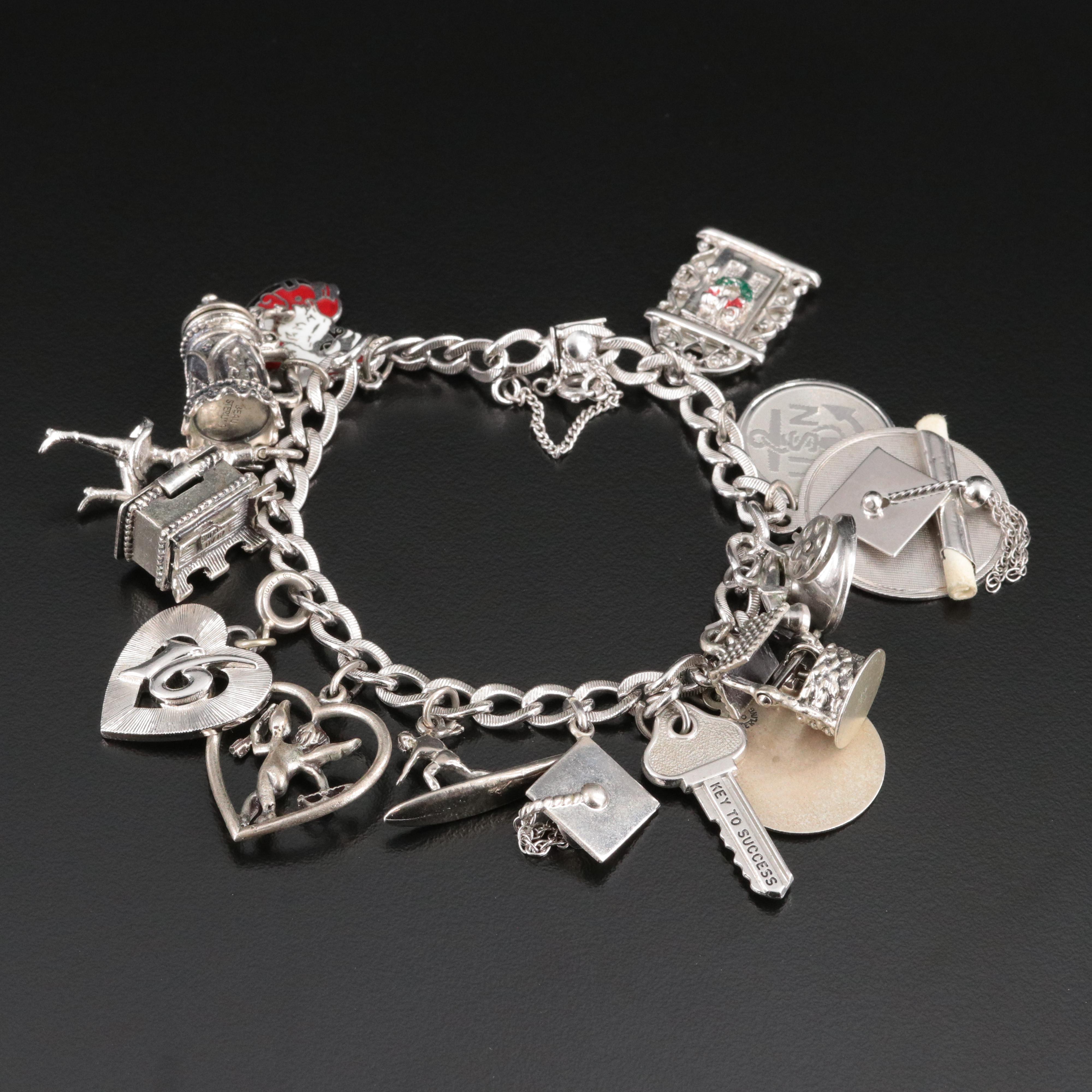 Vintage Sterling Charm Bracelet Featuring Articulated Charms