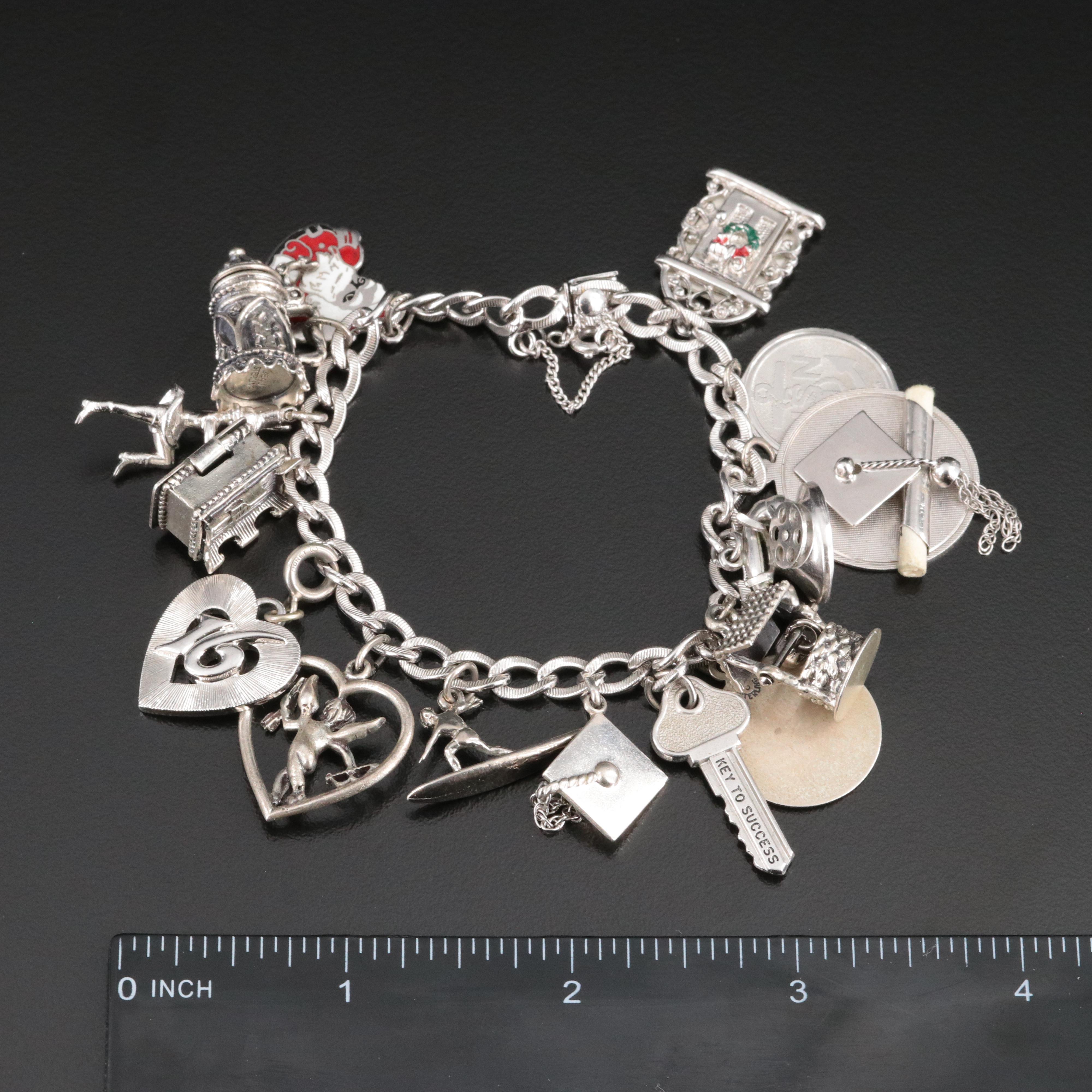 Vintage Sterling Charm Bracelet Featuring Articulated Charms