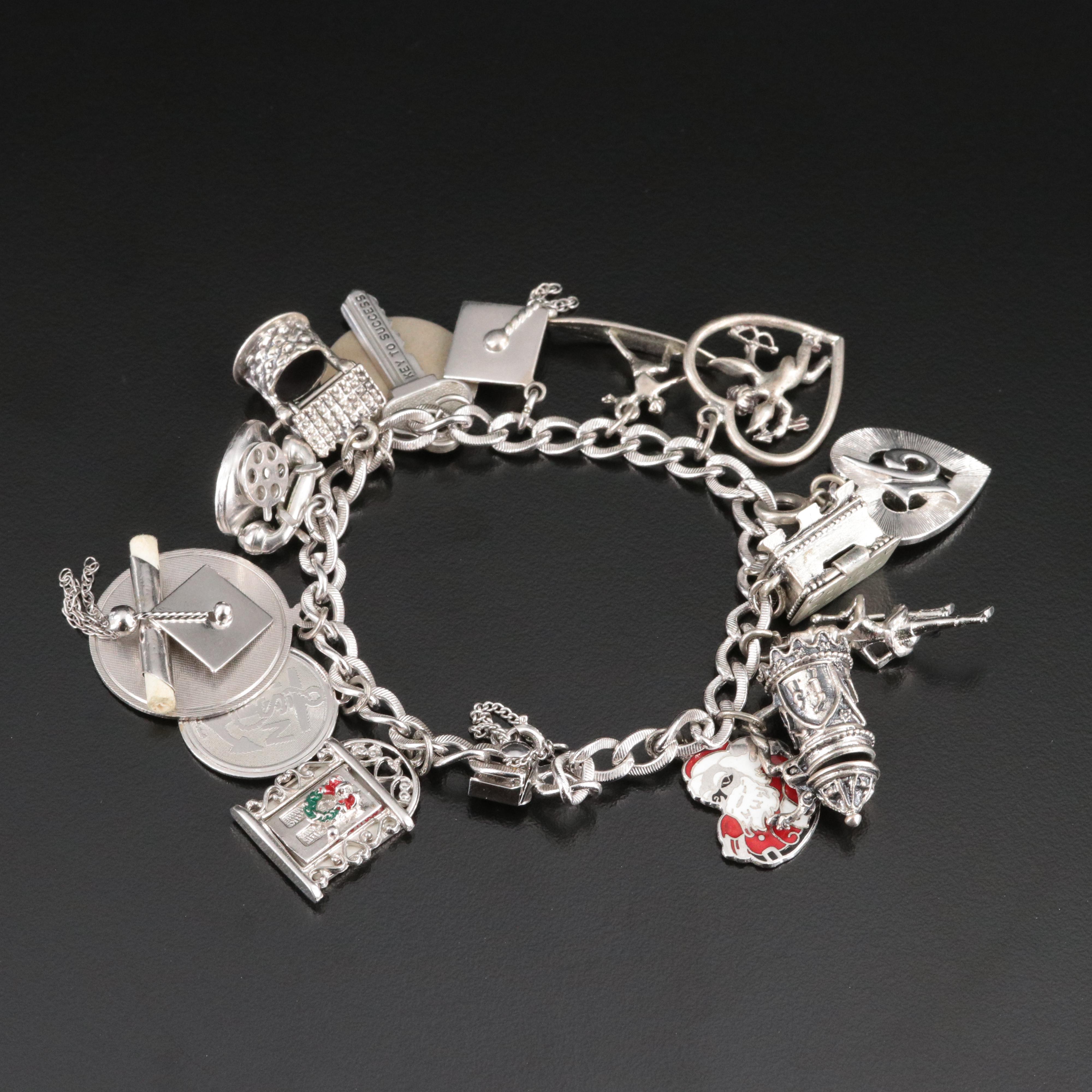 Vintage Sterling Charm Bracelet Featuring Articulated Charms