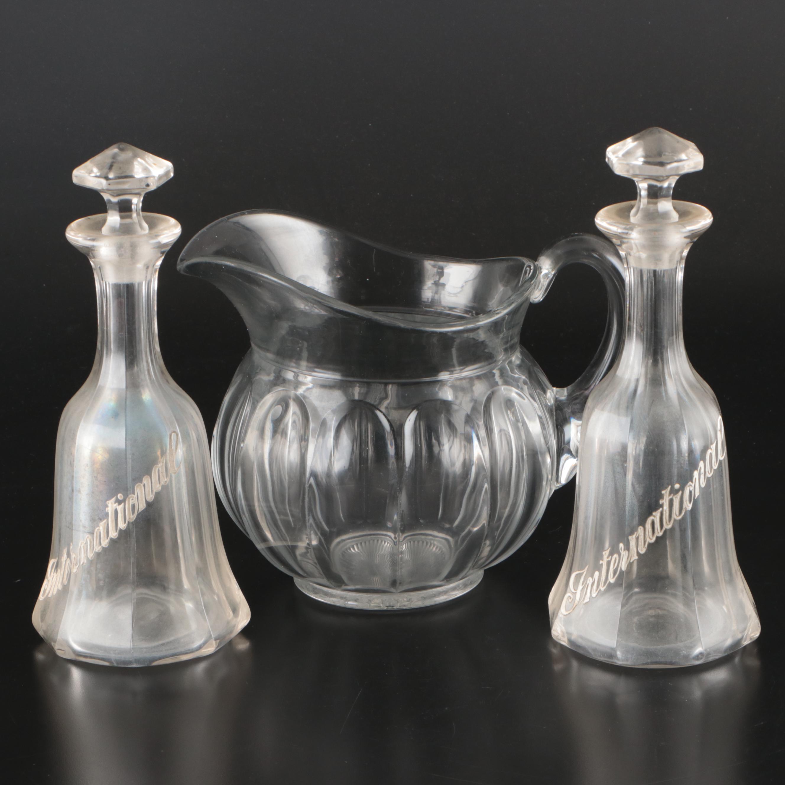Heisey Glass Pitcher with Glass Decanters
