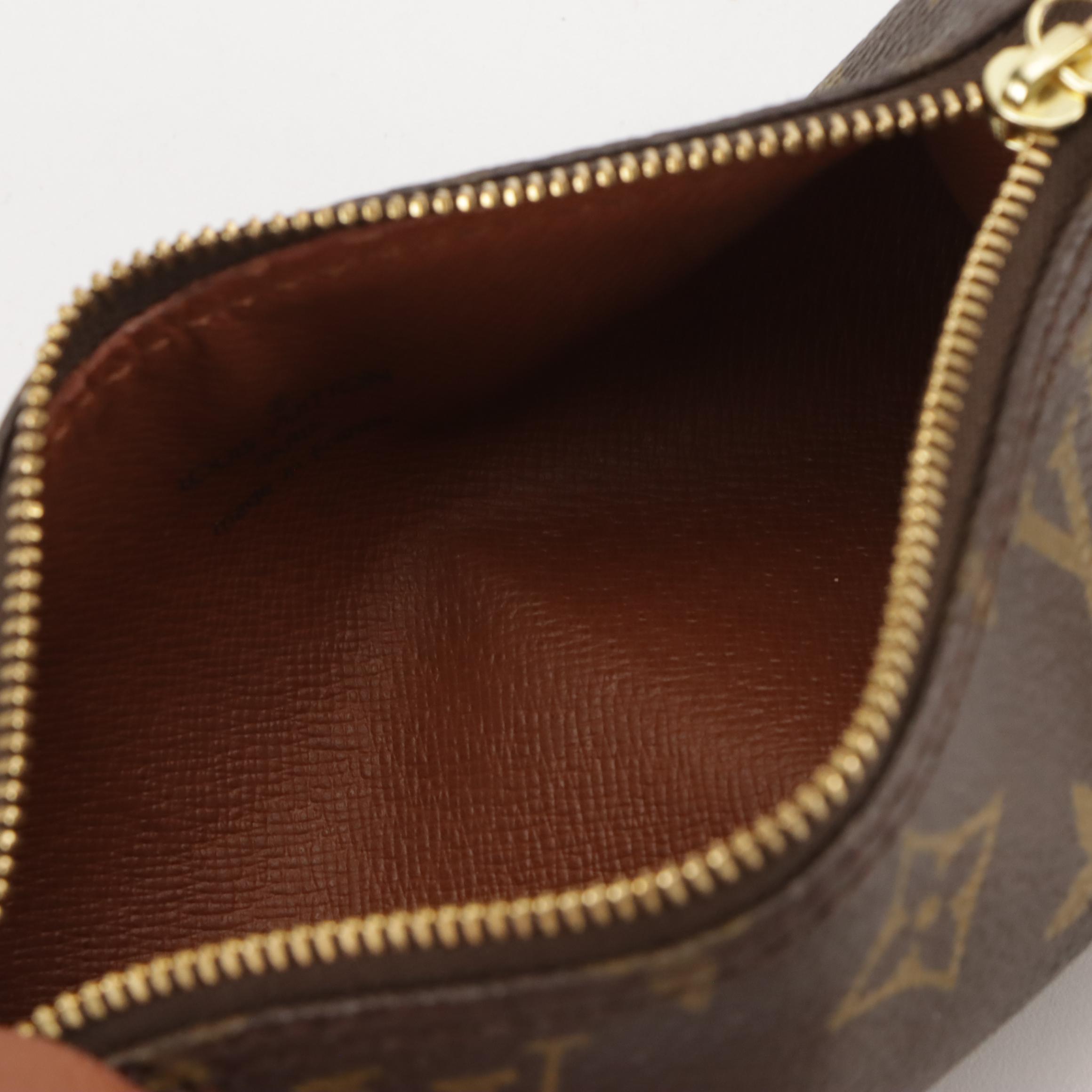 Louis Vuitton Papillon Pochette in Monogram Canvas and Leather
