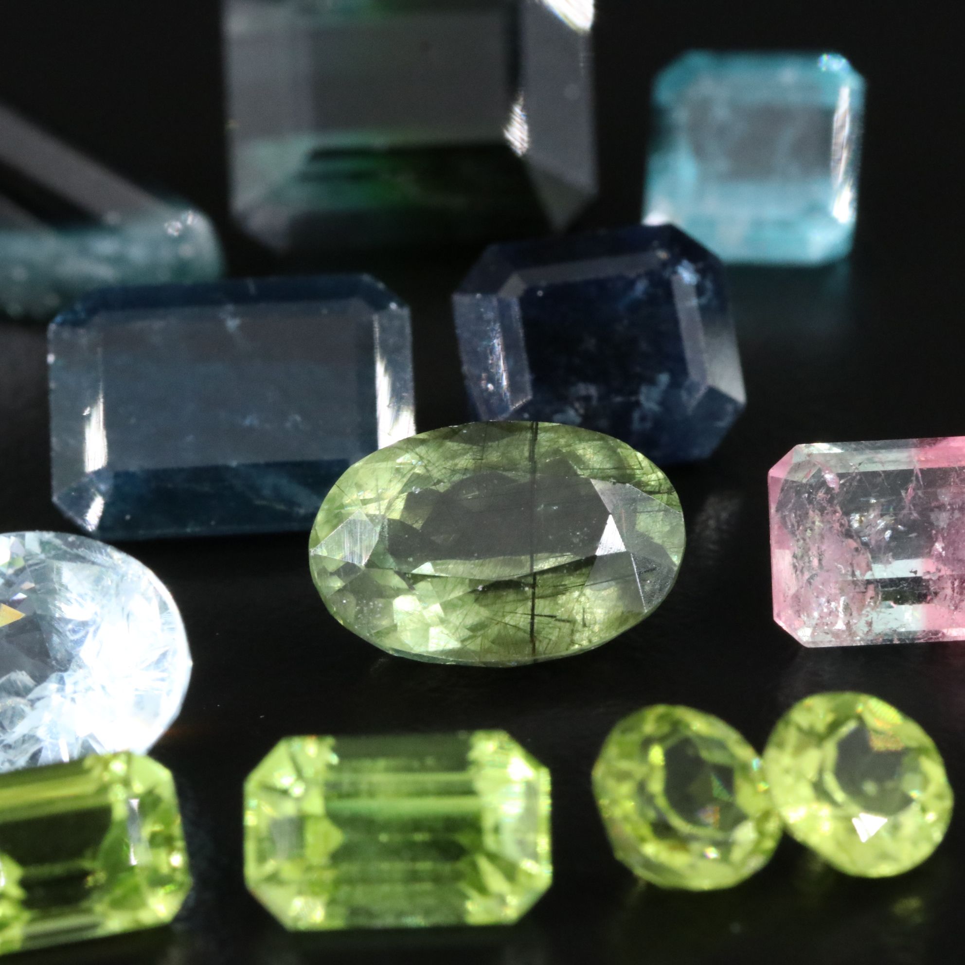 Loose 45.32 CTW Gemstone Lot Including Tourmaline, Peridot and Aquamarine