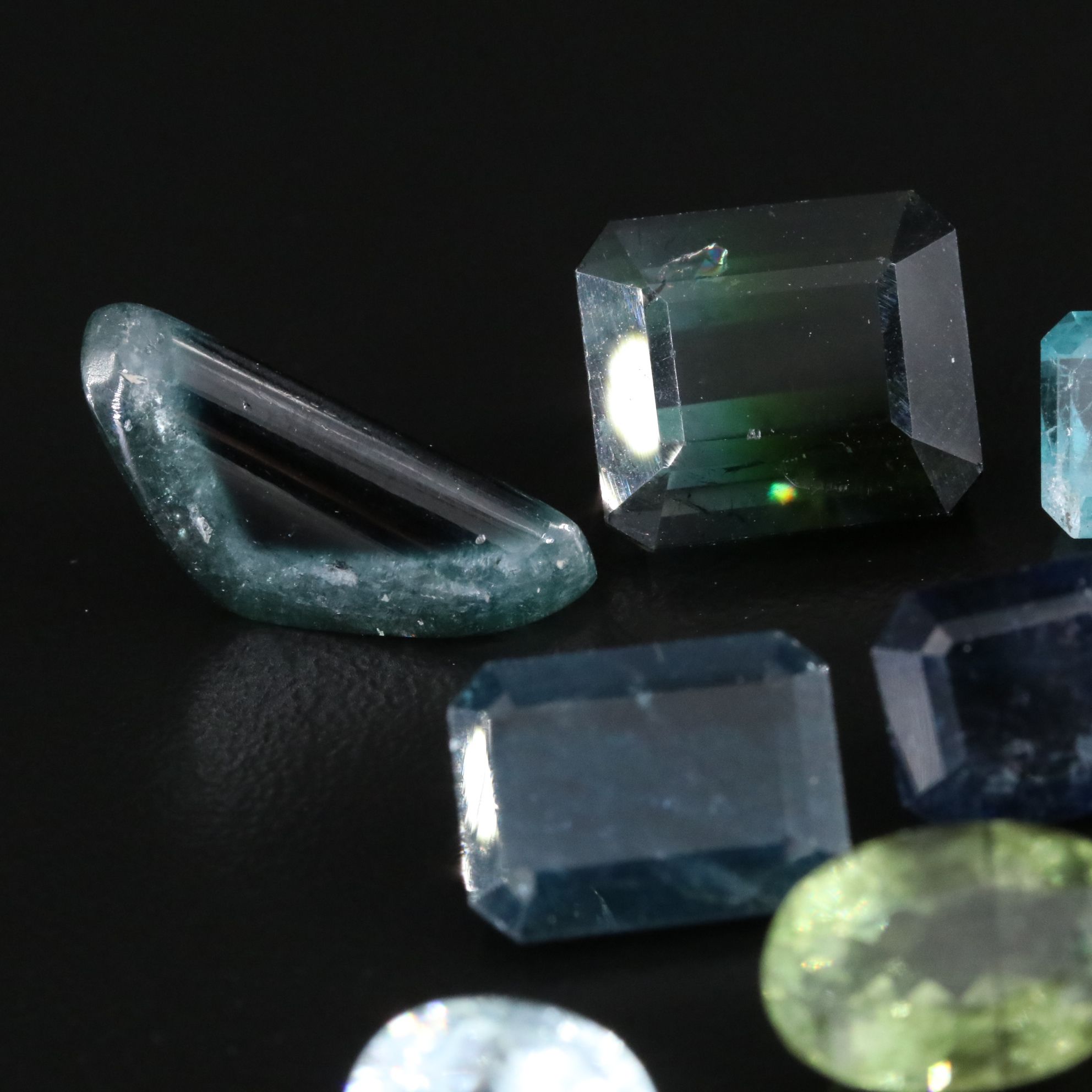Loose 45.32 CTW Gemstone Lot Including Tourmaline, Peridot and Aquamarine