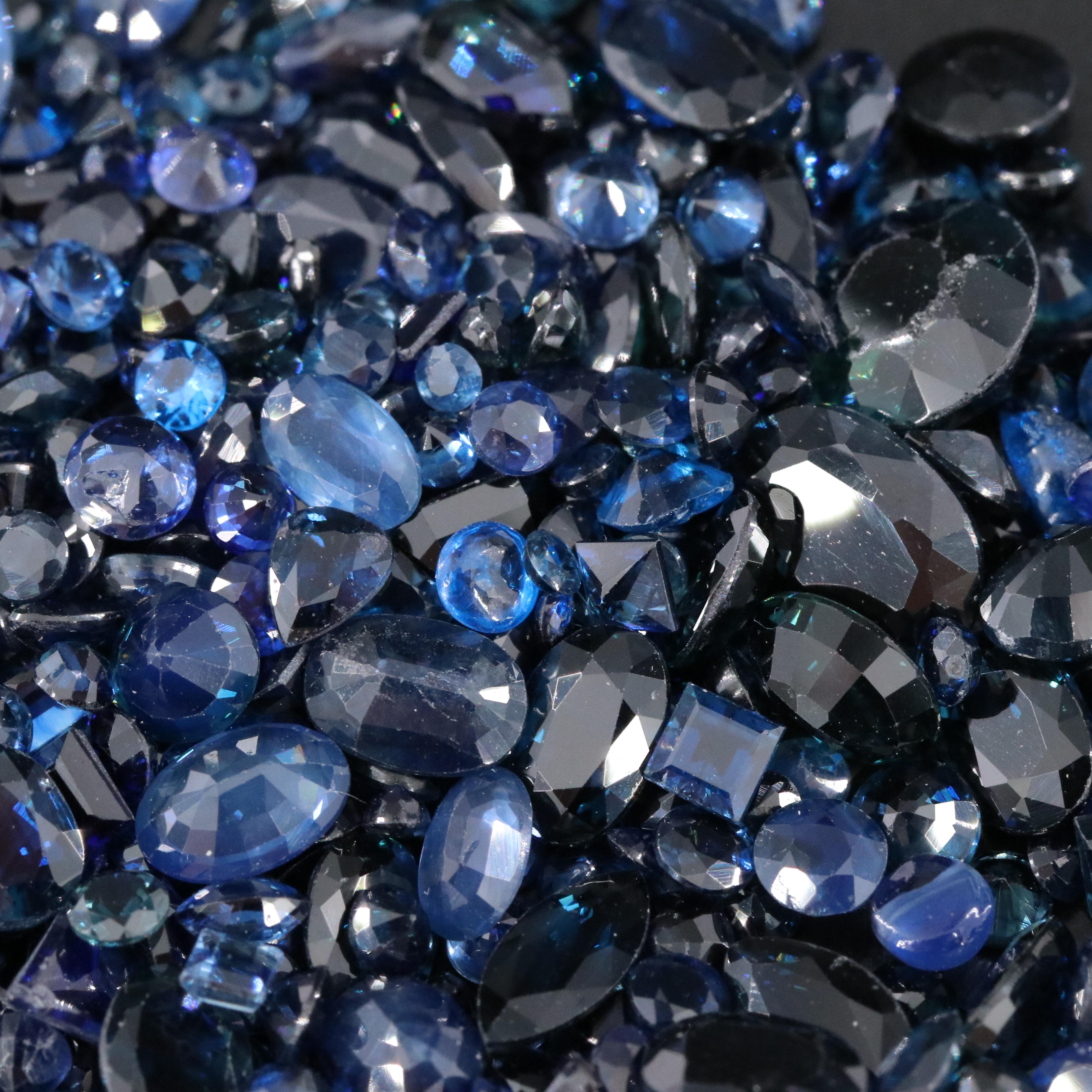 Loose 120.92 CTW Gemstone Lot Including Sapphire, Lab Grown Spinel and Glass