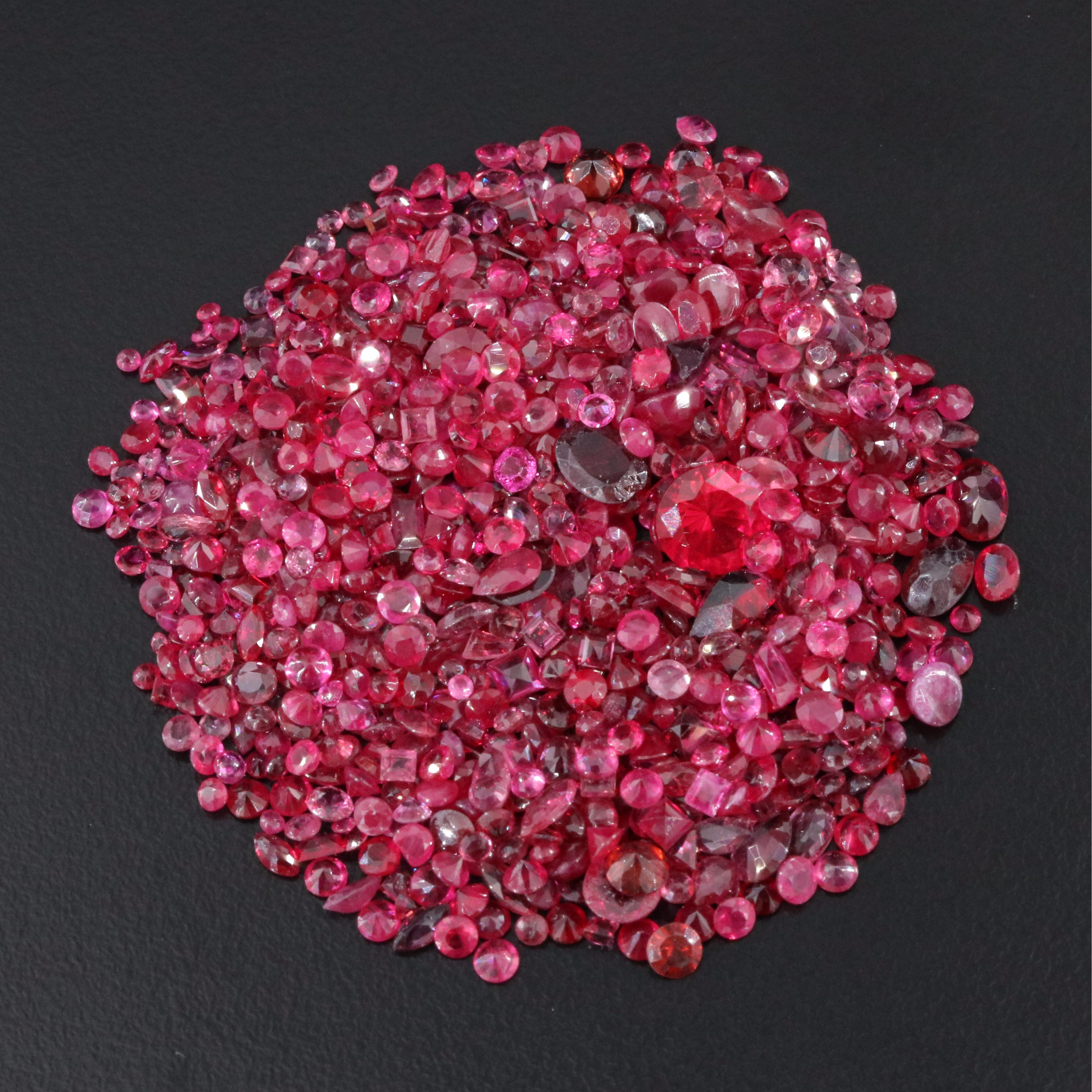 Loose 95.28 CTW Gemstone Lot Including Ruby, Lab Grown Ruby and Garnet