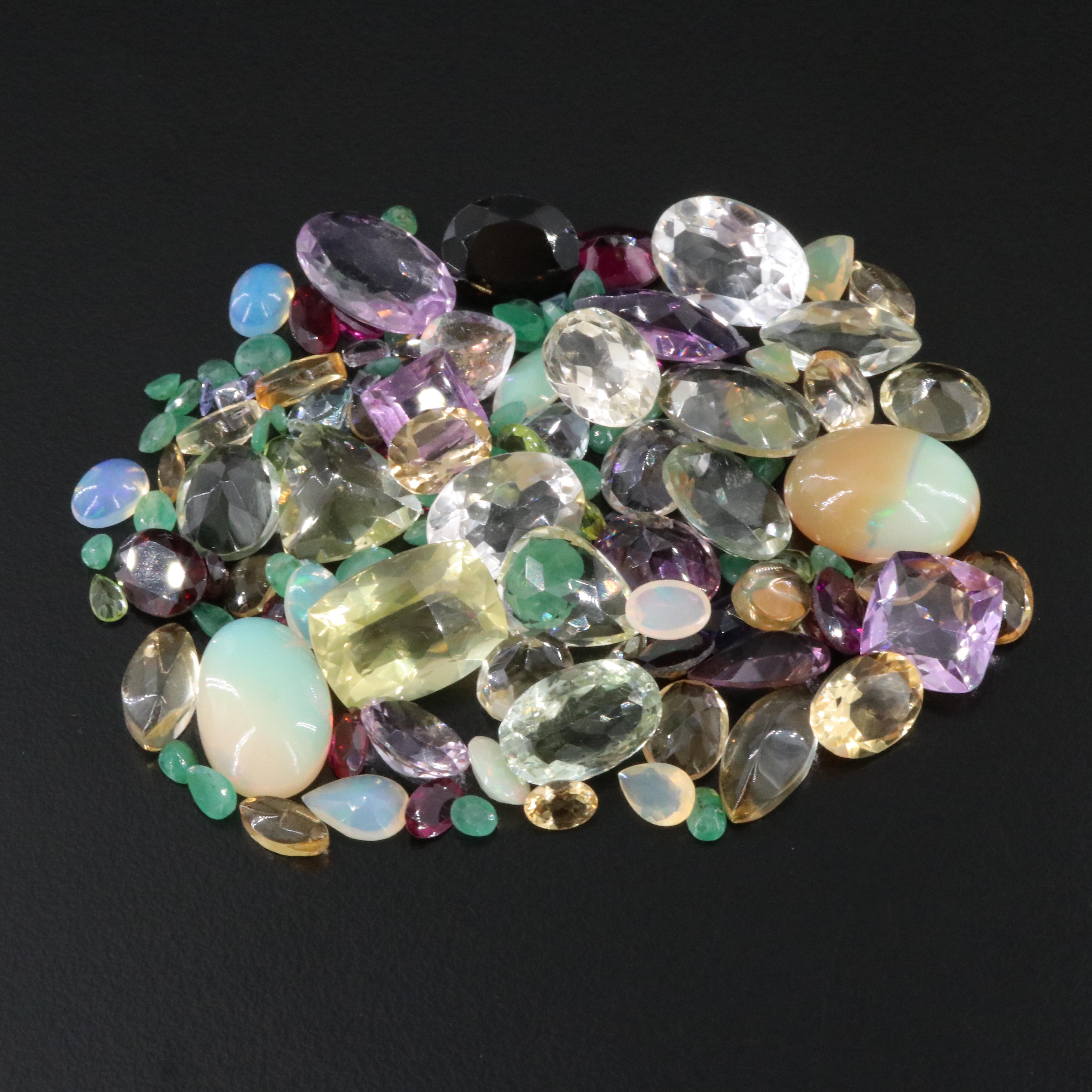 Loose 158.98 CTW Gemstone Lot Including Emerald, Opal and Amethyst