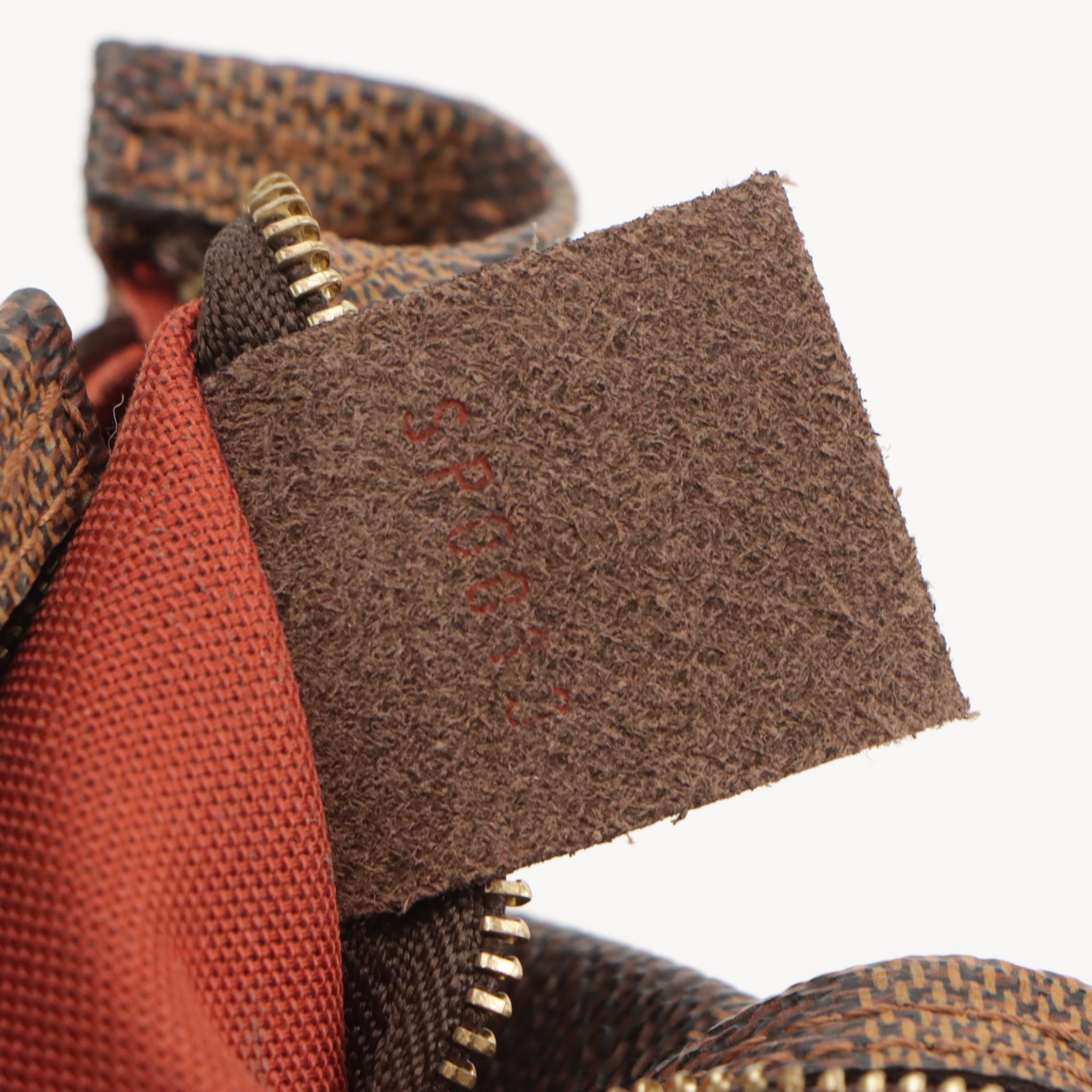 Louis Vuitton Trousse Accessoires Pochette Bag in Damier Ebene Canvas