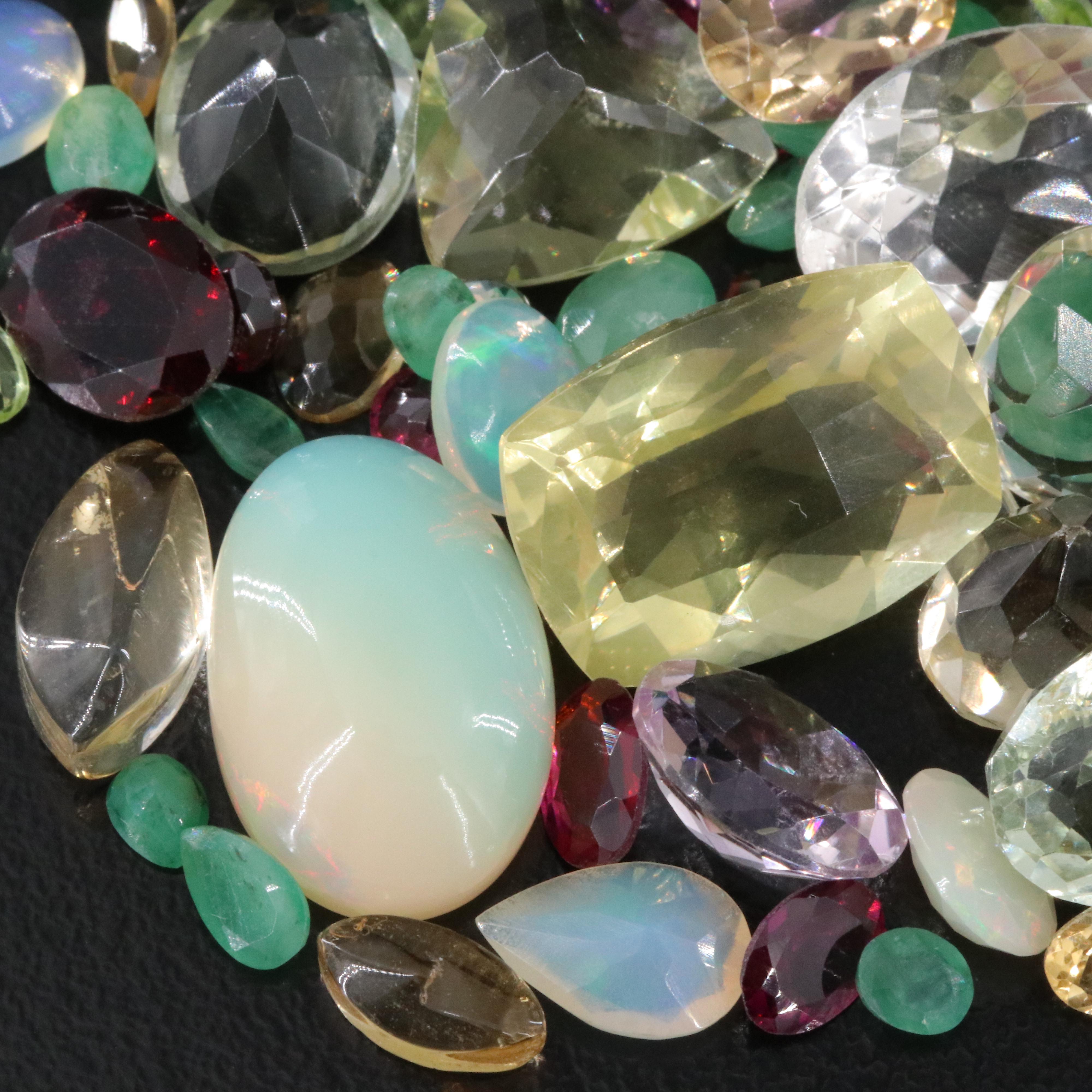 Loose 158.98 CTW Gemstone Lot Including Emerald, Opal and Amethyst